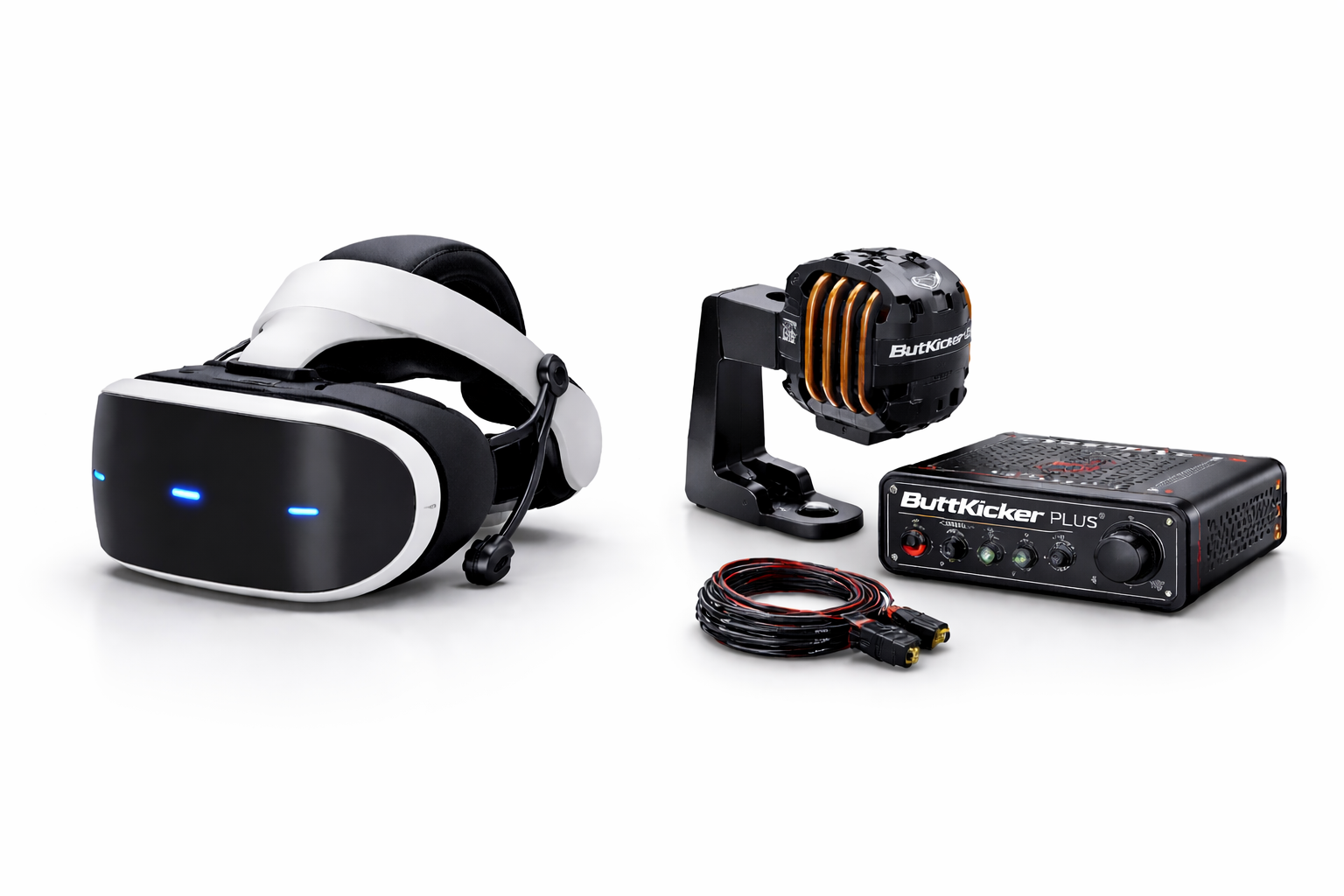 Virtual reality headset, motion platform with a ButtKicker device, and audio equipment laid out on a white background.