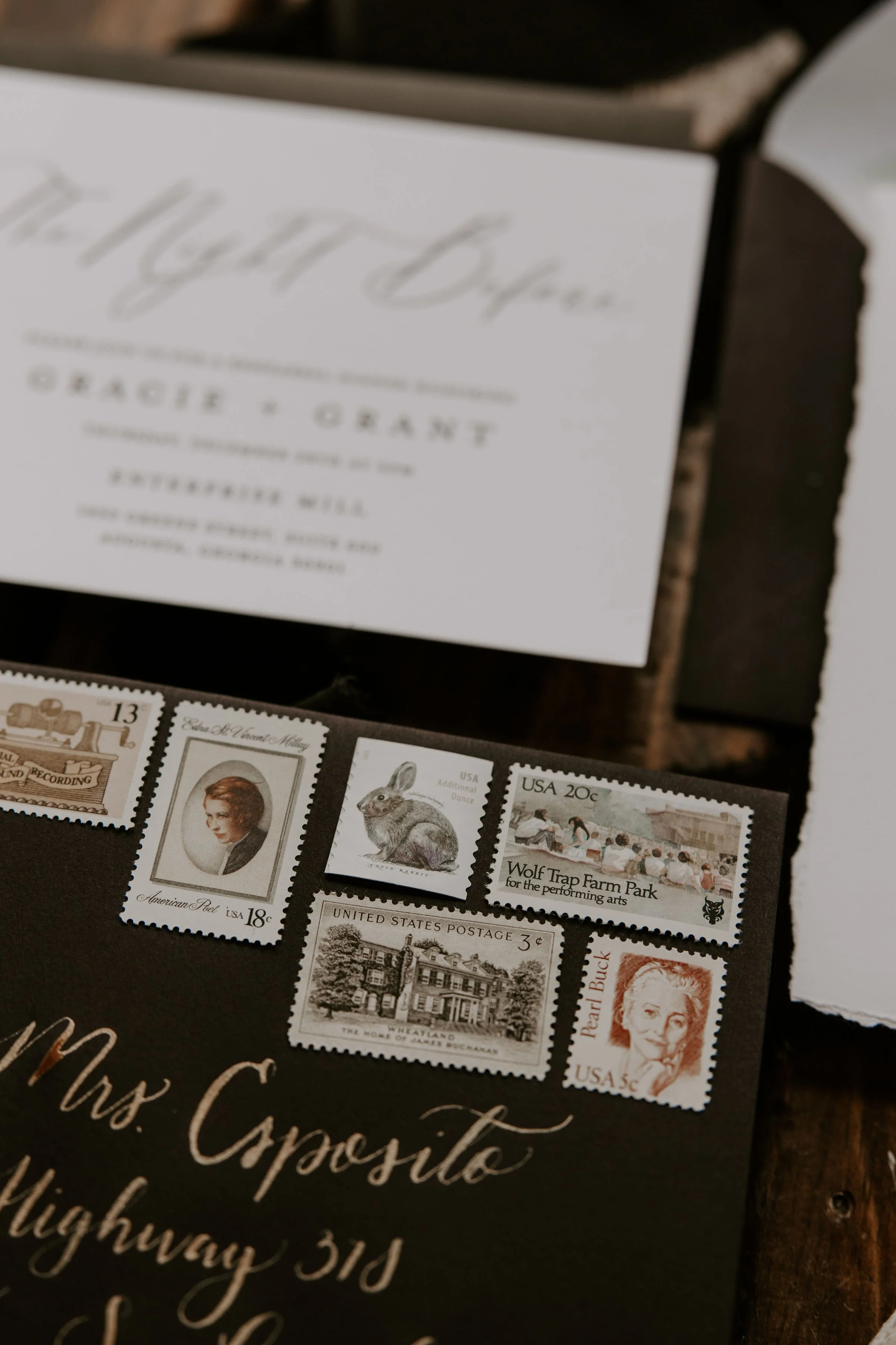 Envelope with five vintage U.S. postage stamps featuring a woman, a rabbit, a landscape, and a performer, addressed to Mrs. Cposito on Highland 3rd.