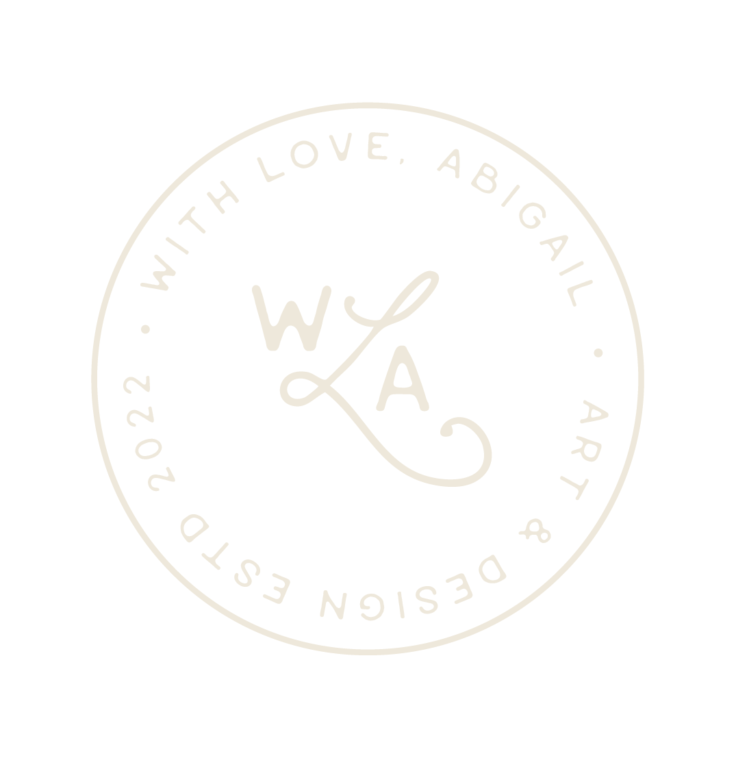 Circular logo with text around the edge reading 'WITH LOVE, ABIGAIL & DESIGN EST. 2022'. Inside the circle, stylized initials 'W', 'A', and a calligraphic 'L' and 'C' are arranged creatively.