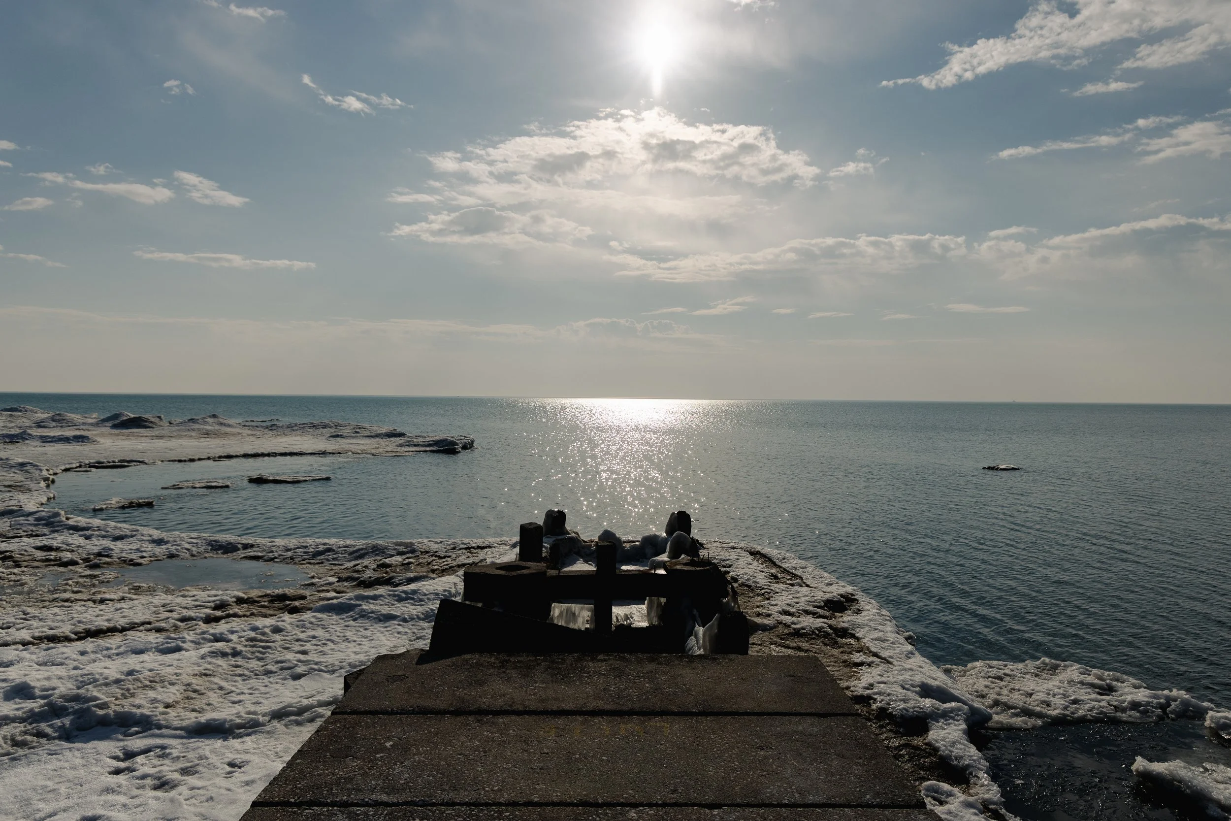 broken-dock-winter-lake-michigan-icy-waterfront-landscape-photography.jpg