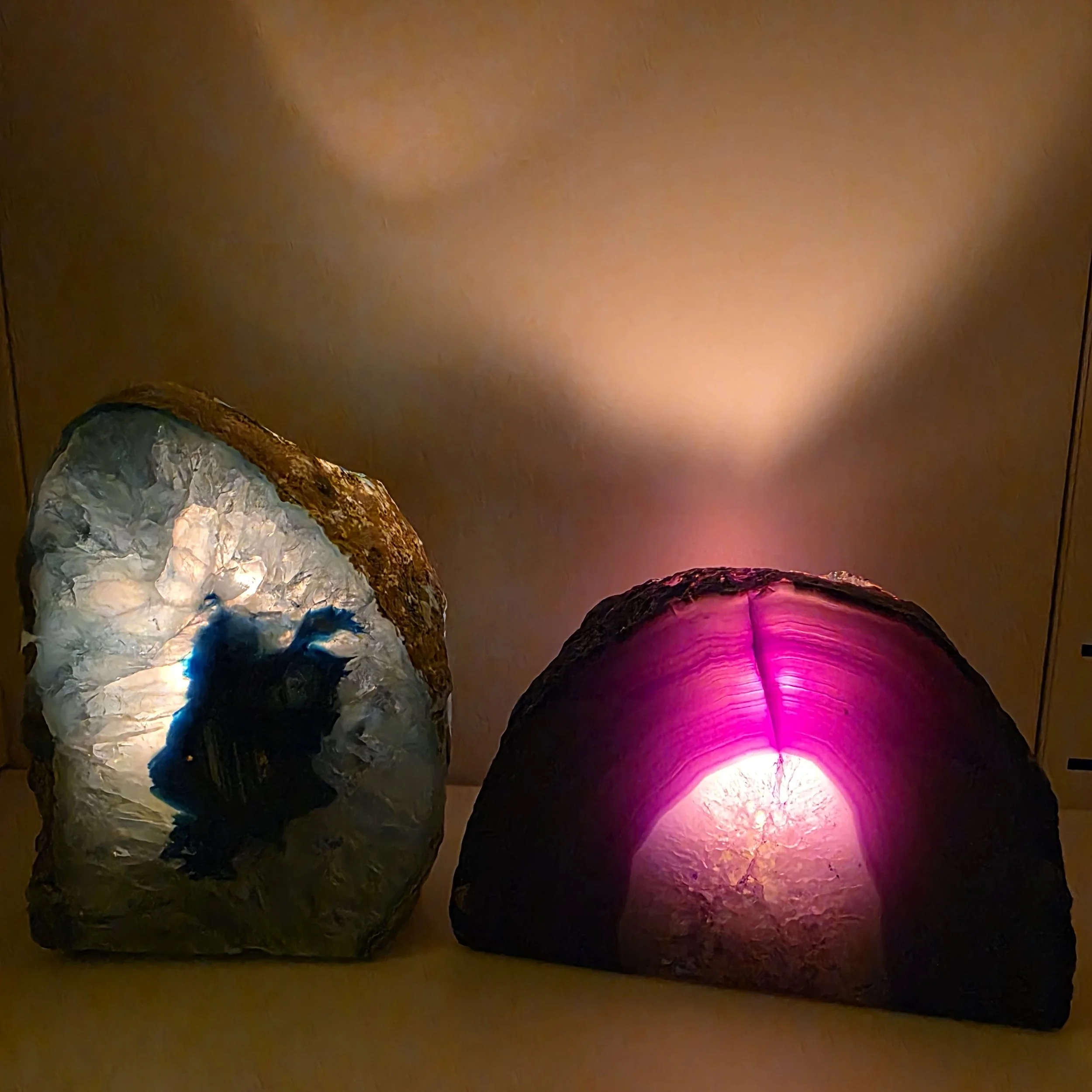 blue and purple dyed agate candle holders in dark
