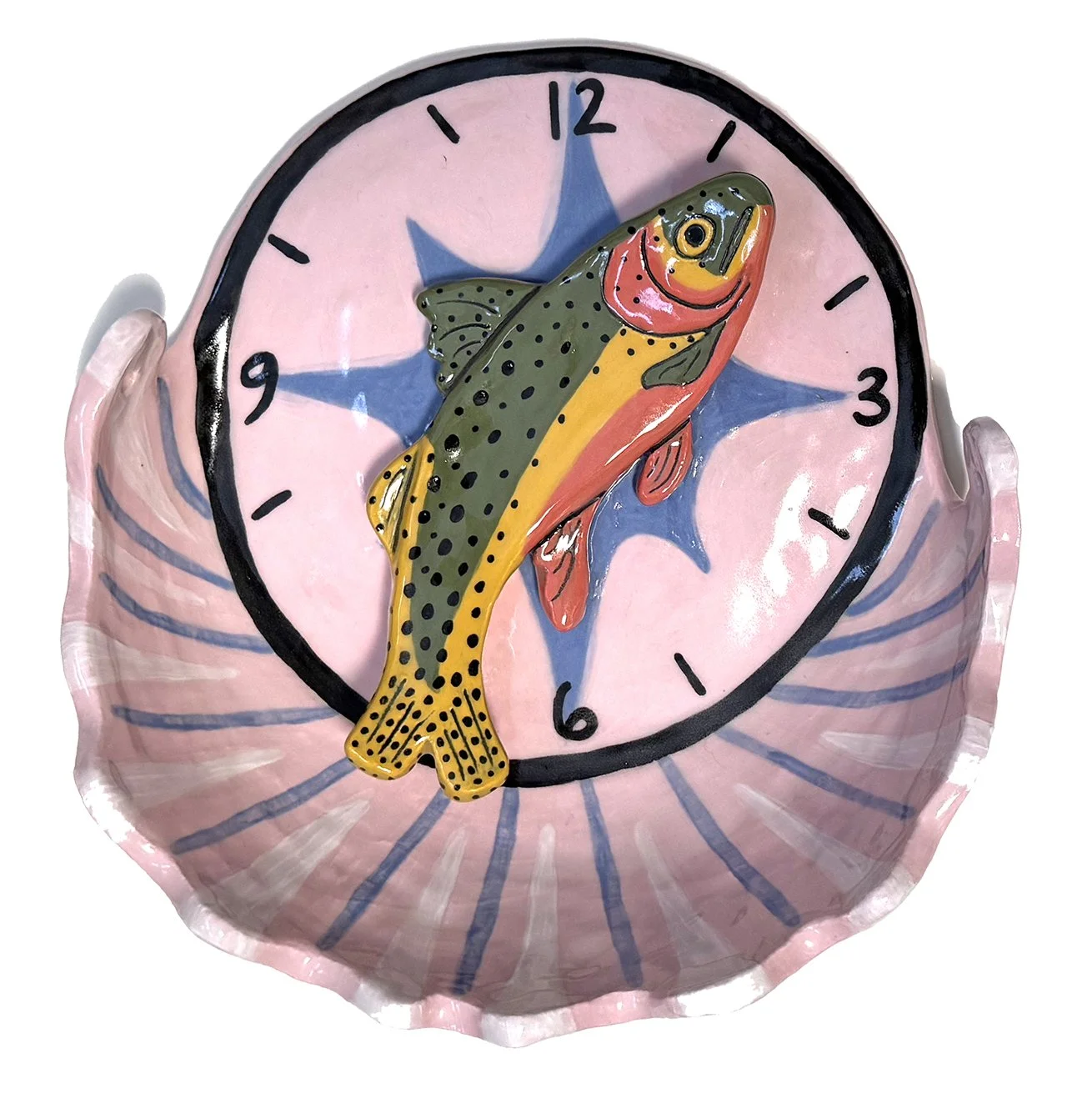 Decorative clock with a painted rainbow trout fish in the center, set on a pink and blue background.