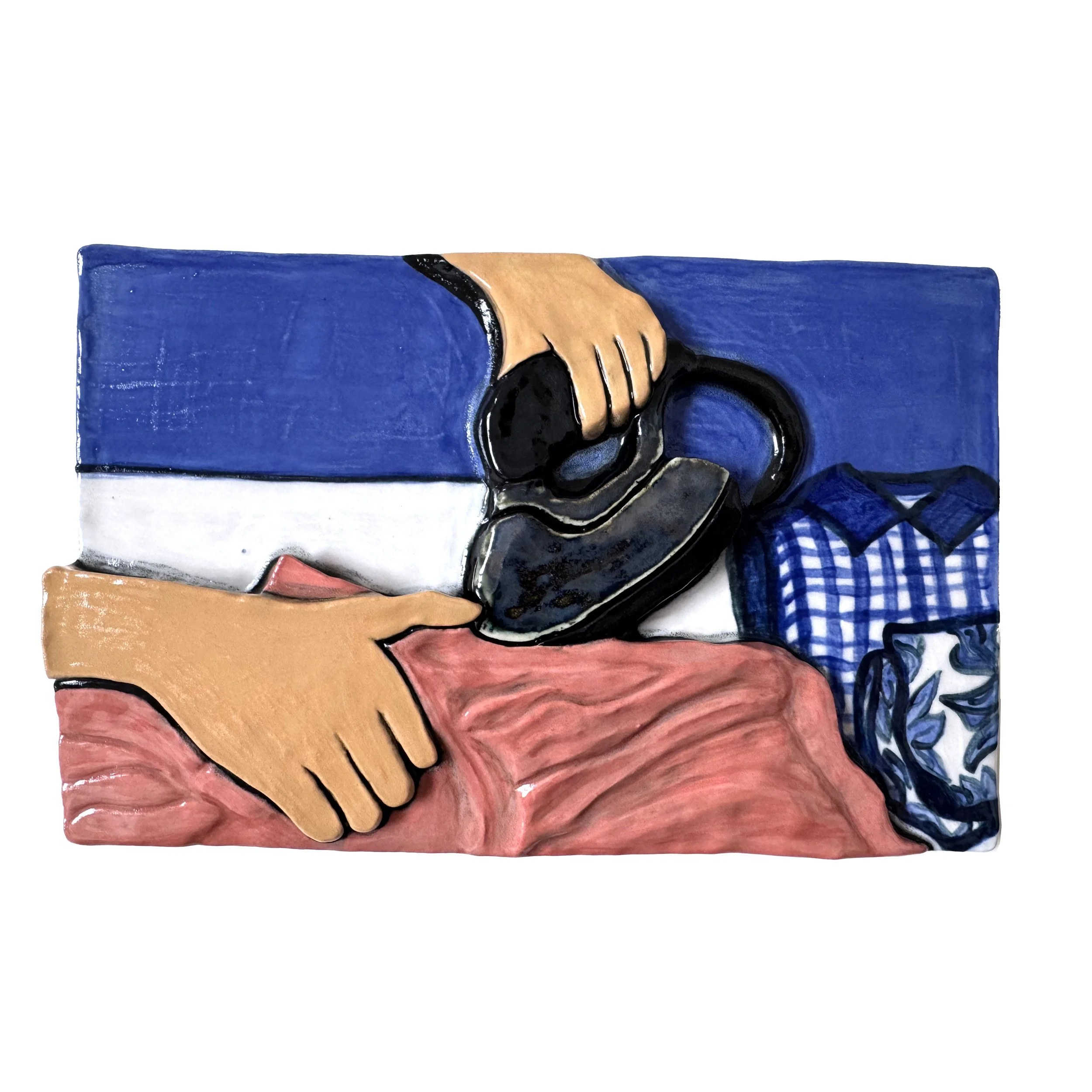 A ceramic artwork depicting hands, a telephone, a napkin, a blue checkered shirt, and a floral pattern.