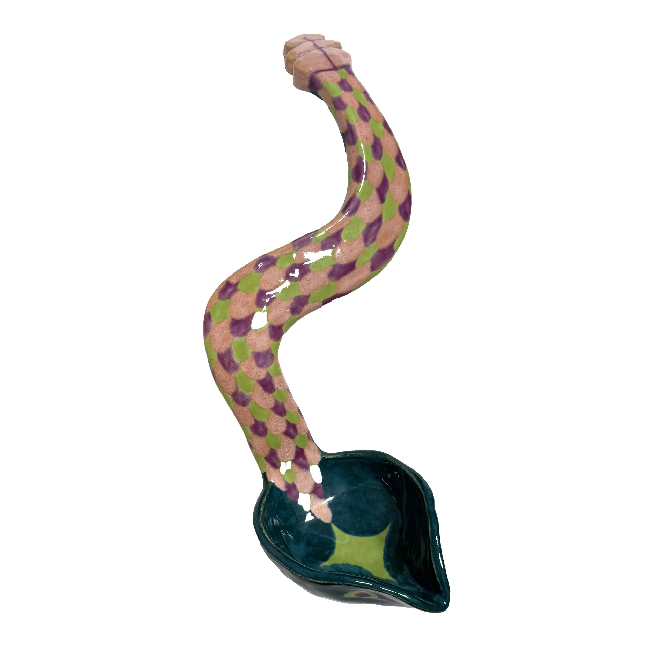 Ceramic laddle of a snake with a colorful, scale-like pattern on its body.