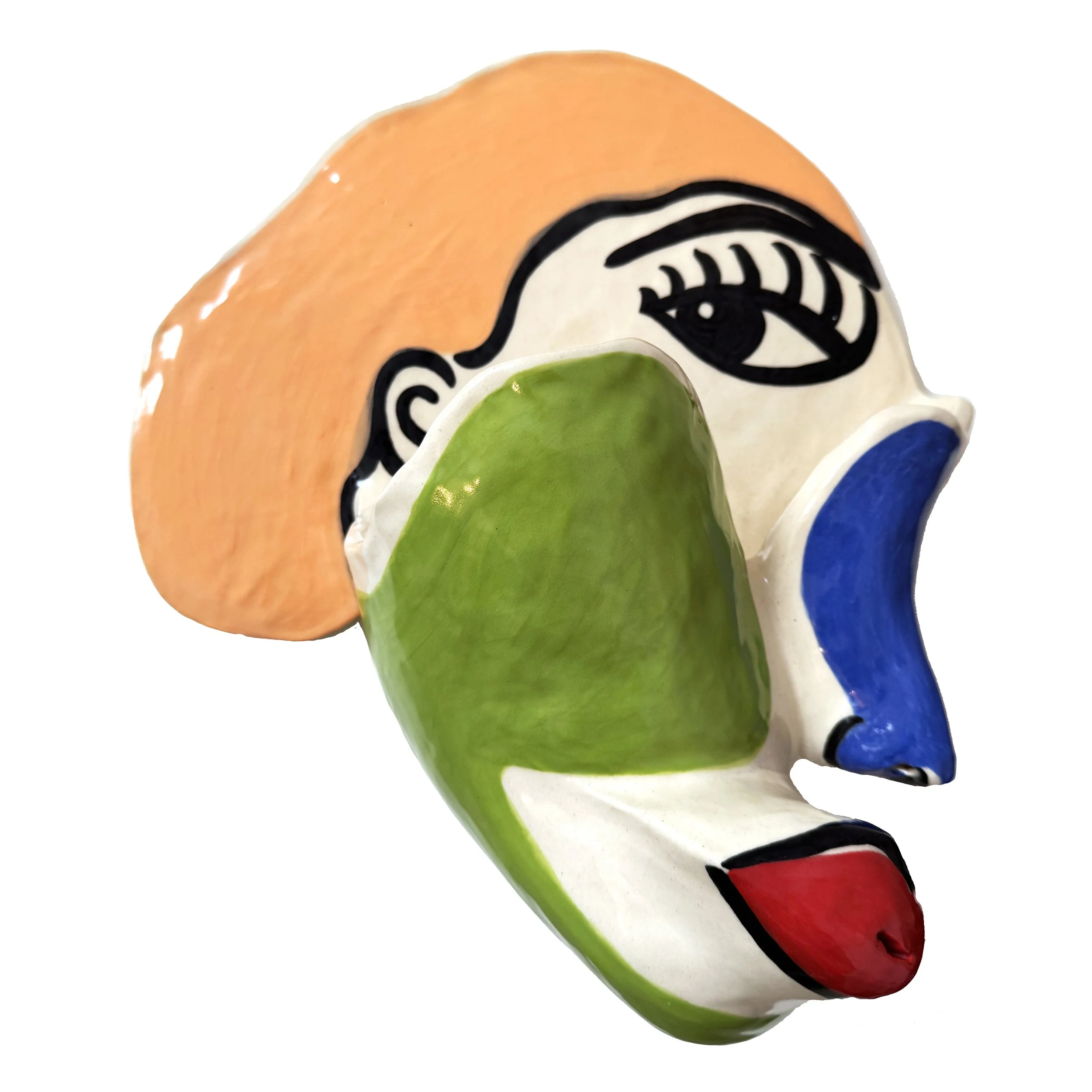 Large, ceramic sculpture with stylized facial features and vibrant colors.