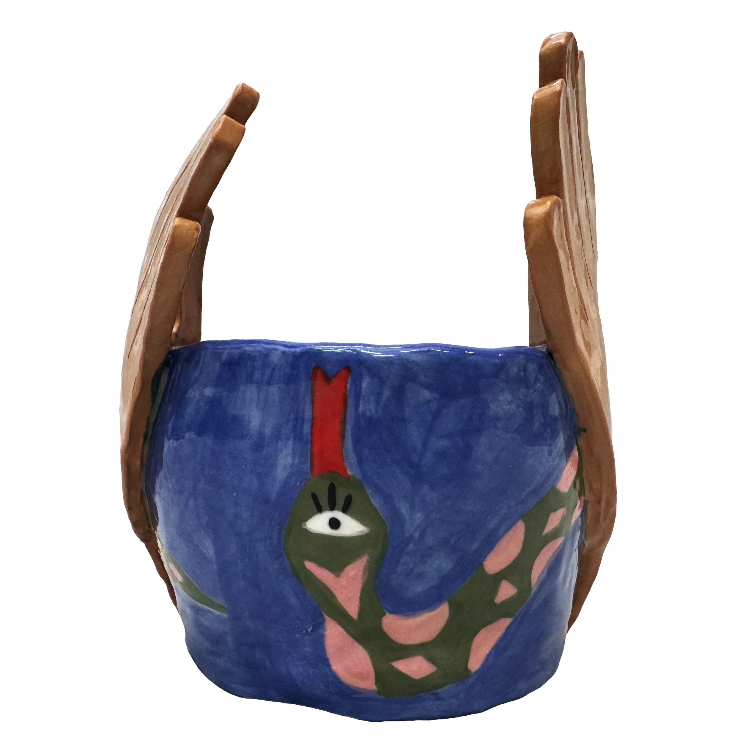 Painted ceramic bowl with a blue background, featuring a snake with a green body, pink markings, and a face with a third eye, and flat hands as handles.