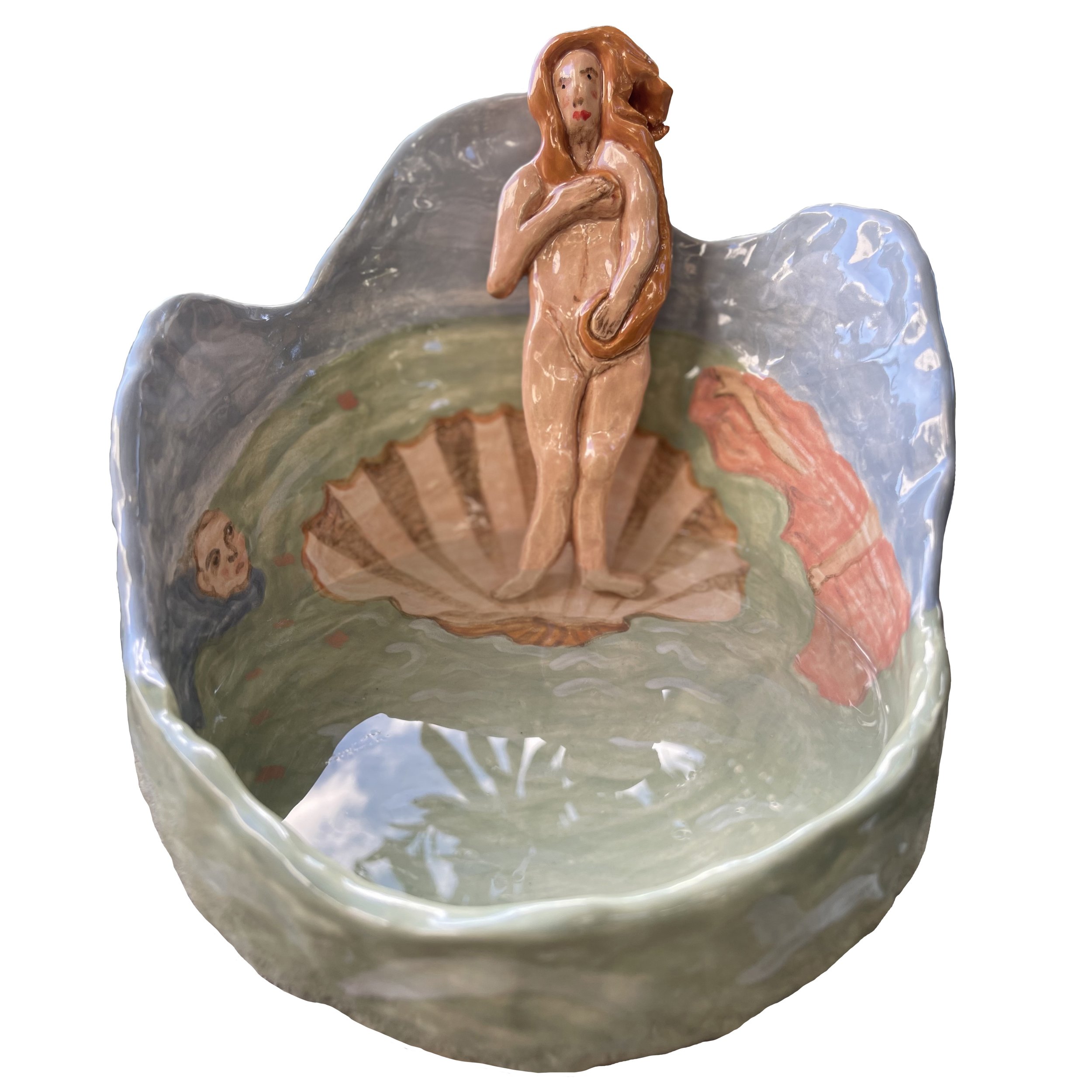 A decorative ceramic bowl with painted images and a shell, with water inside. A female nude, resembling the birth of Venus, protrudes from the background.