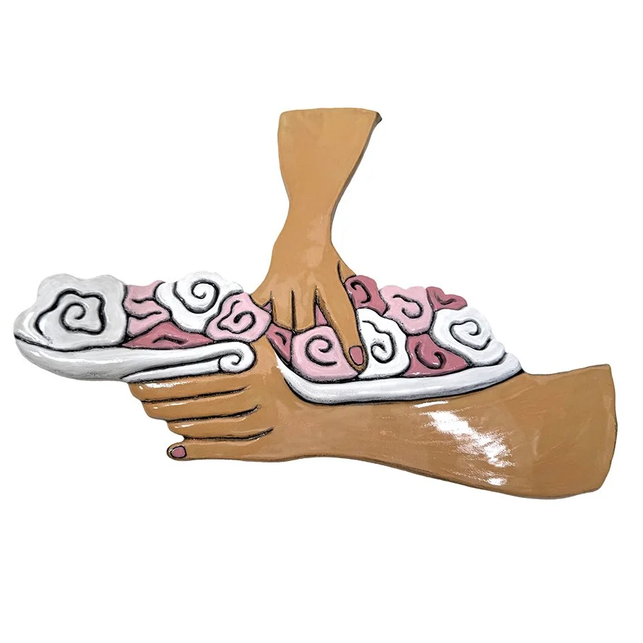 A ceramic art piece depicting a hand holding a bunch of flowers in swirling patterns, in a cartoonish style.