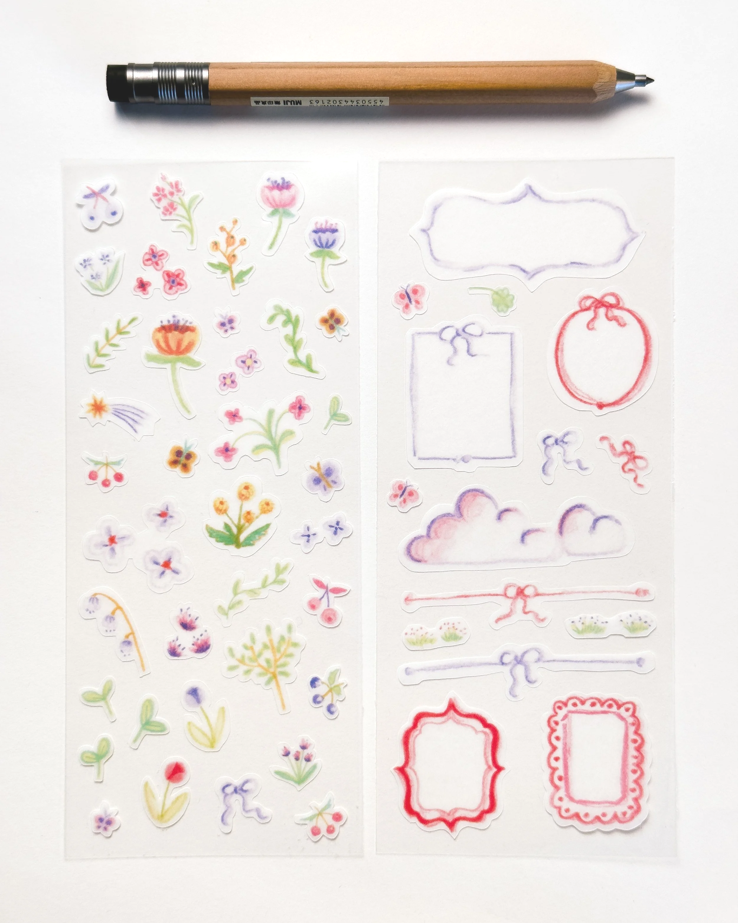 Sheet of floral and decorative stickers with flowers, clouds, ribbons, and frames, placed on a white background with a pencil at the top.