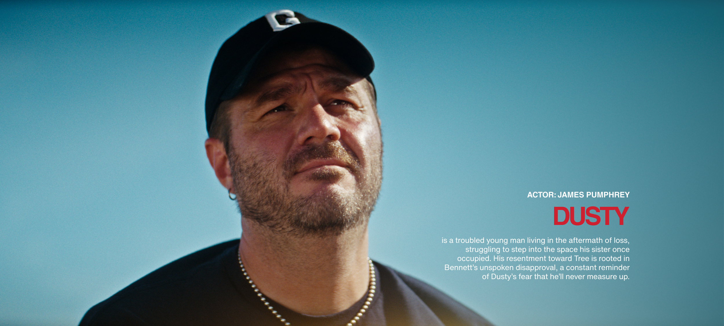 Close-up of a man with a beard and a cap looking thoughtfully into the distance against a clear blue sky. Text on the image includes actor James Pumprey, character Dusty, and a brief description of his backstory.