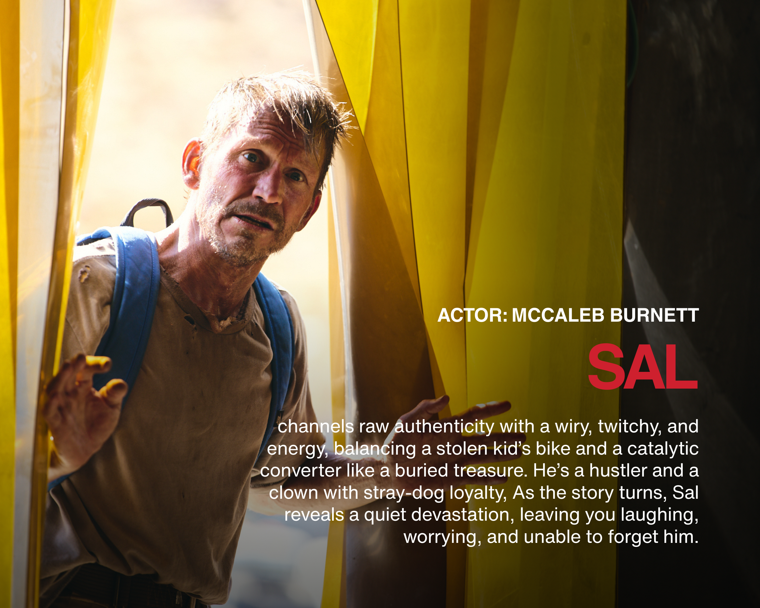 A man with a backpack looking out from behind yellow boats