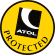 ATOL protected sticker with black and white logo on yellow background