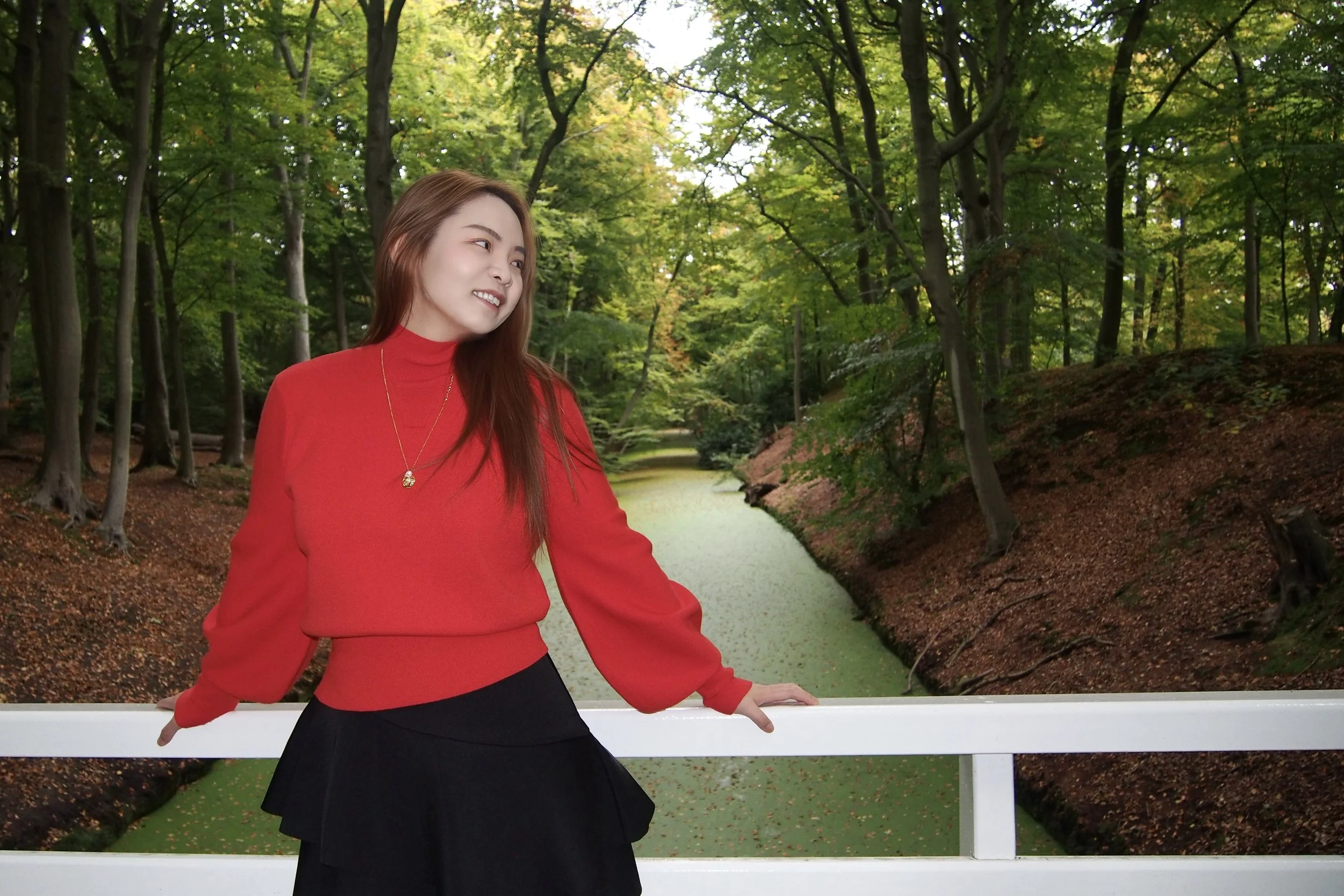 girl in red on bridge.jpg