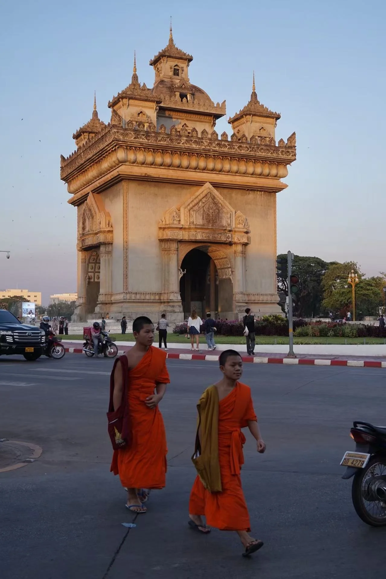 Monks and monument in Vientiane, Laos