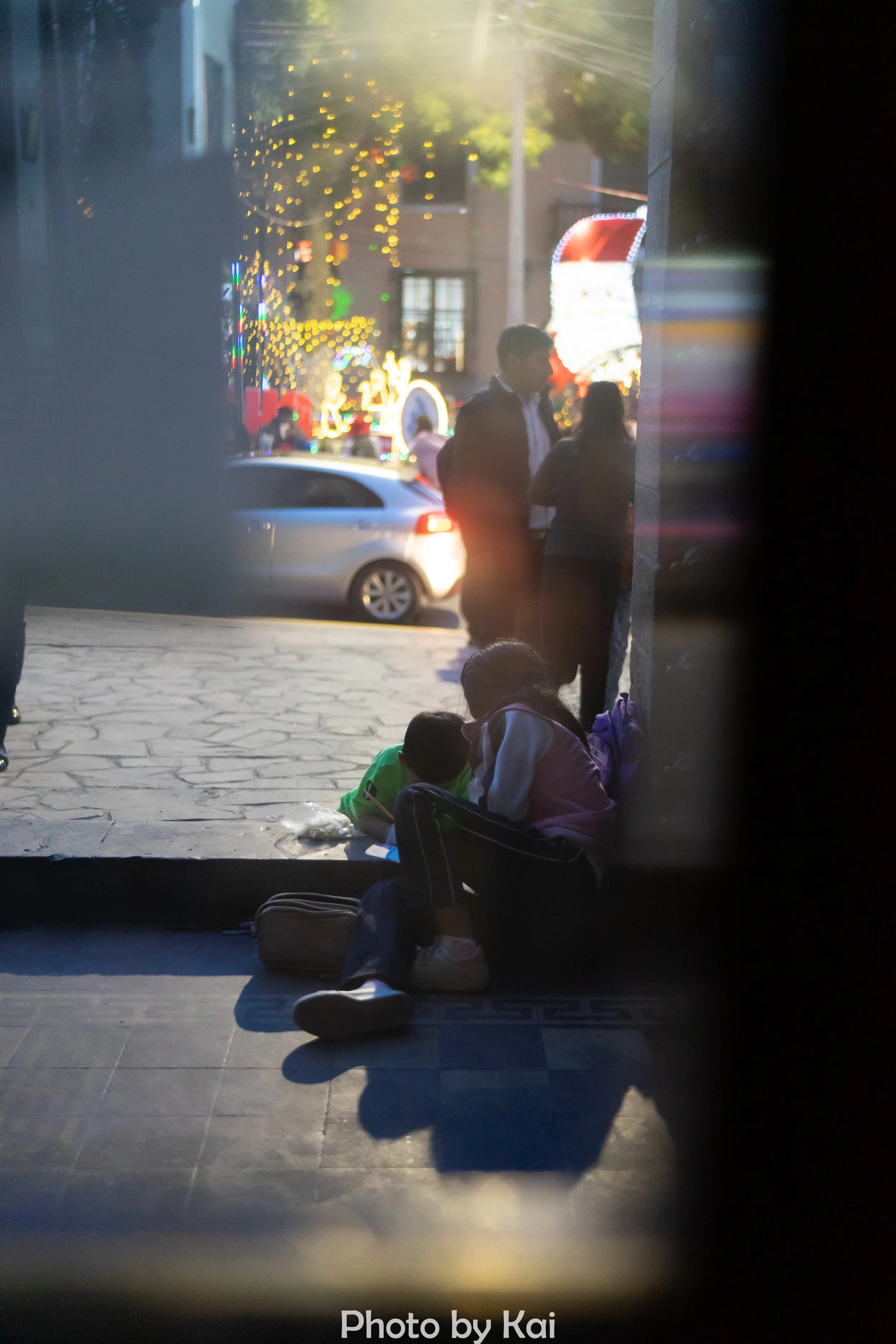 Sister and brother at church gate