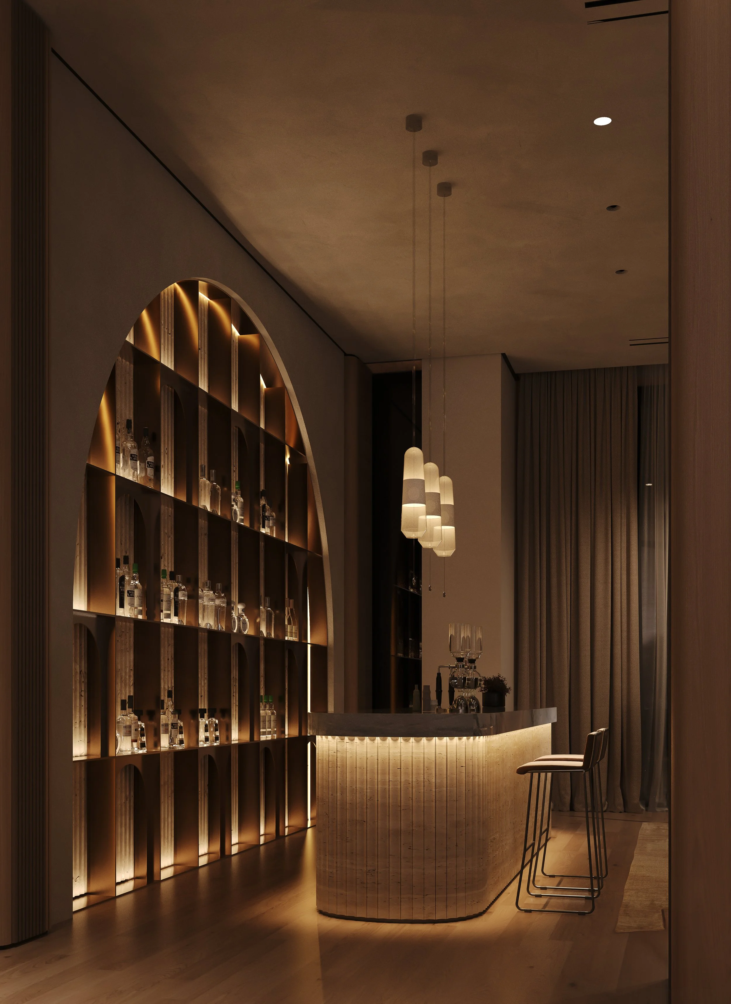 Al Barari villa bar with arched illuminated shelving, marble counter and warm ambient lighting.