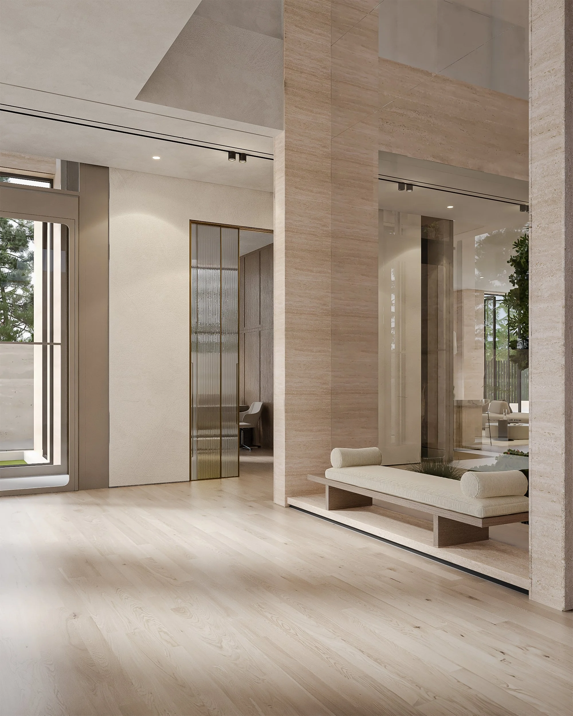 Al Barari villa interior with stone columns, glass partitions, built-in bench and neutral finishes.