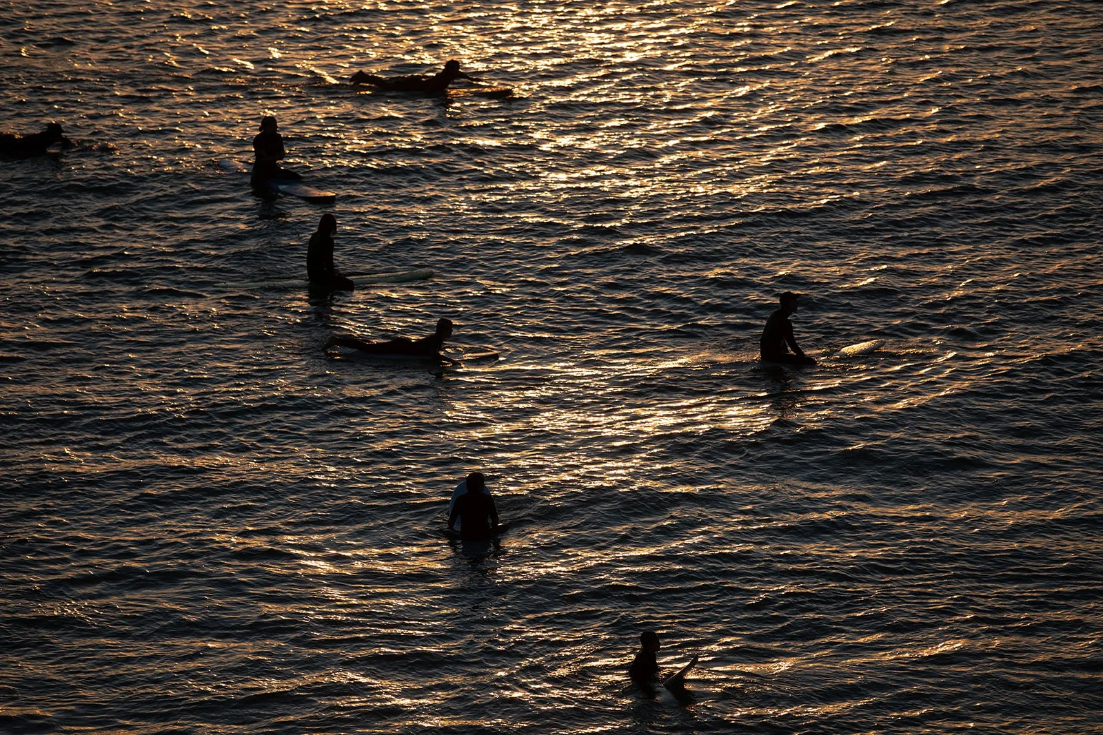 Surfers on Water