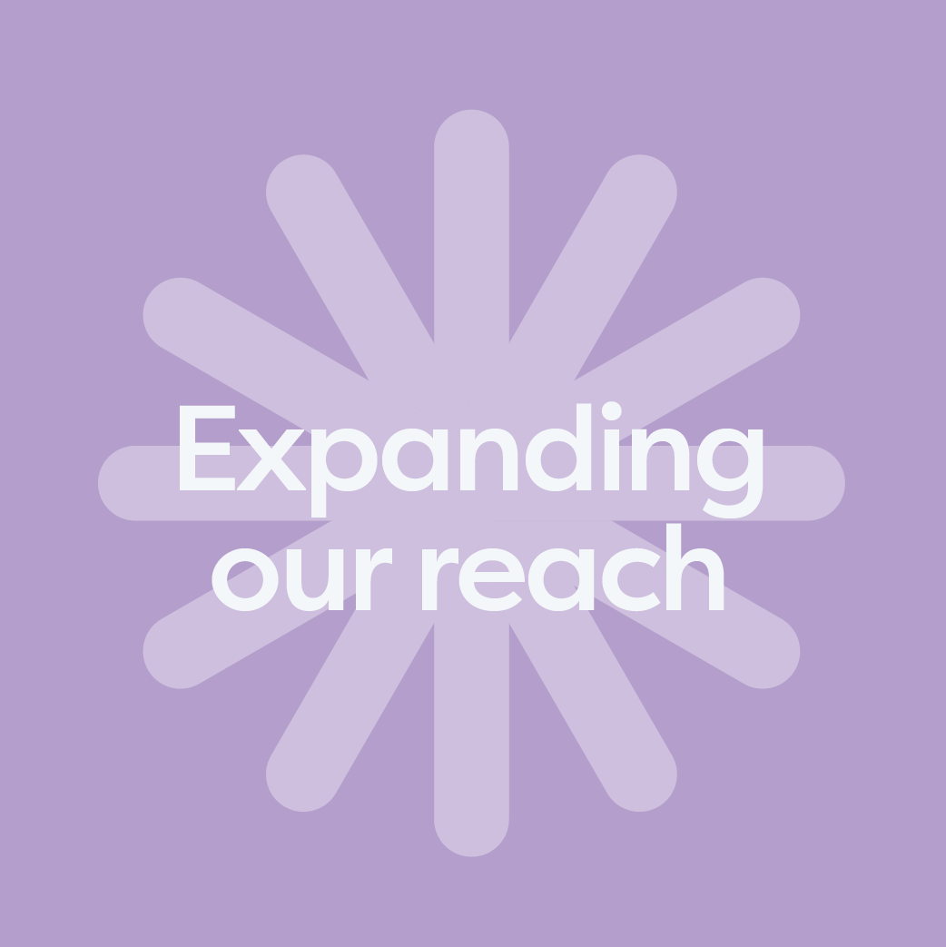Purple background with a white geometric starburst pattern and white text that says 'Expanding our reach.'