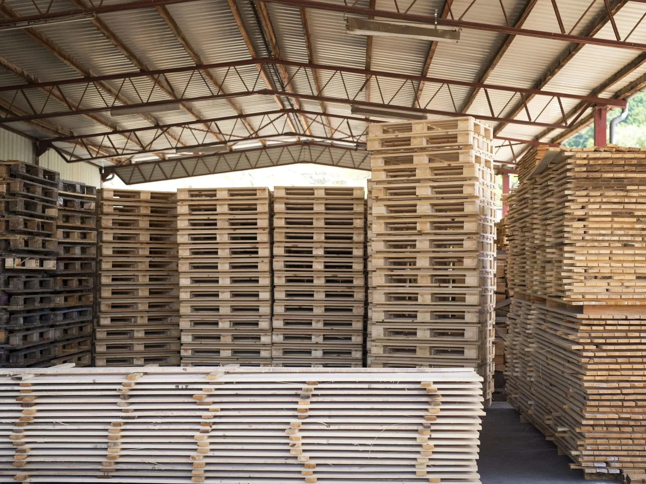 sawmill-factory-warehouse-with-pile-palettes-wood-material-planks%281%29.jpg