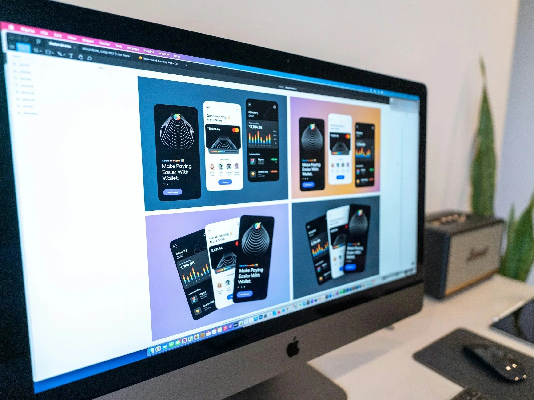 Computer screen displaying mobile app design mockups for a digital wallet application showing what Polaar Media can do for clients when it comes to graphic design.