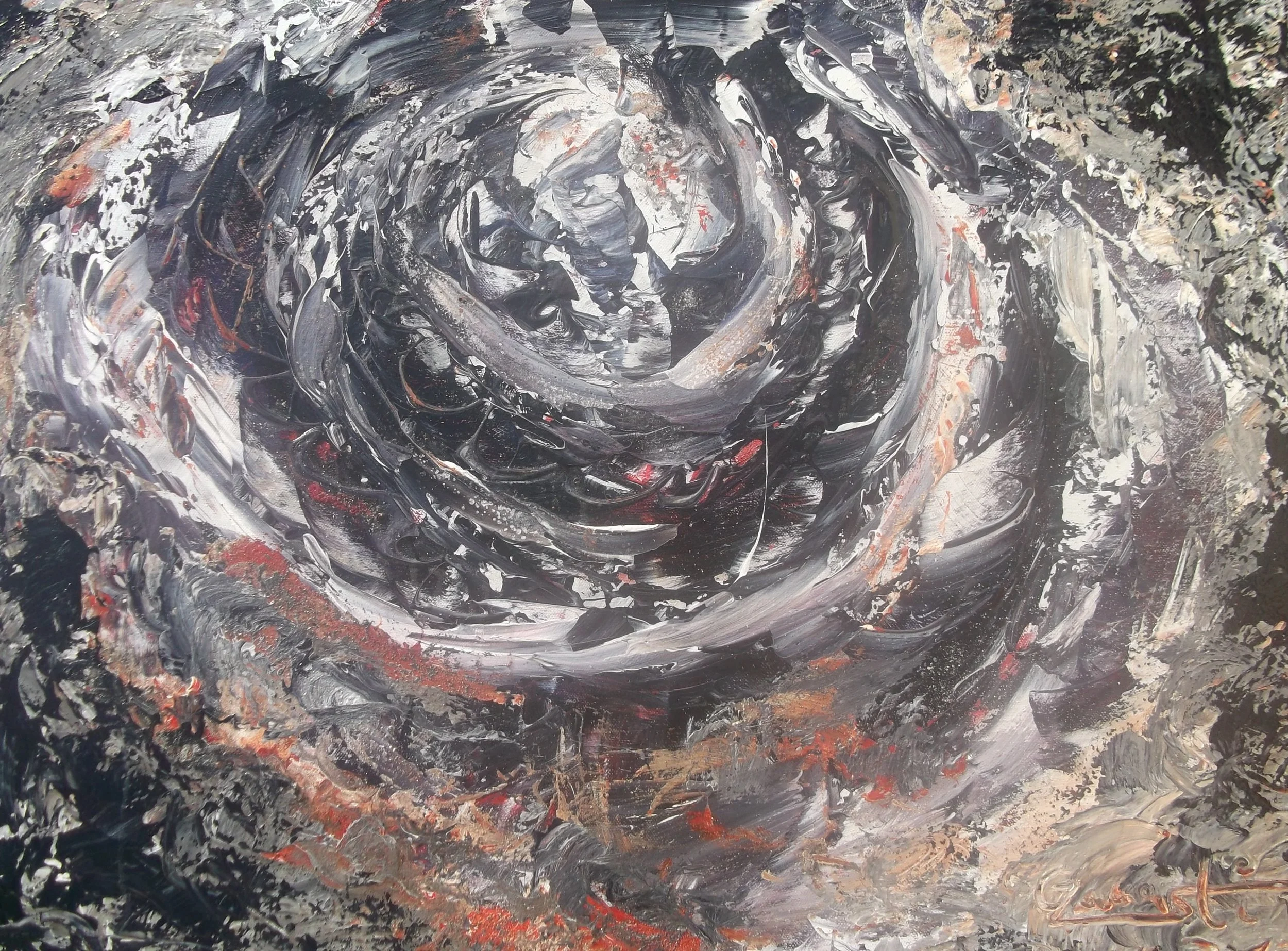 Abstract painting with swirling black, gray, white, and touches of red and orange colors.