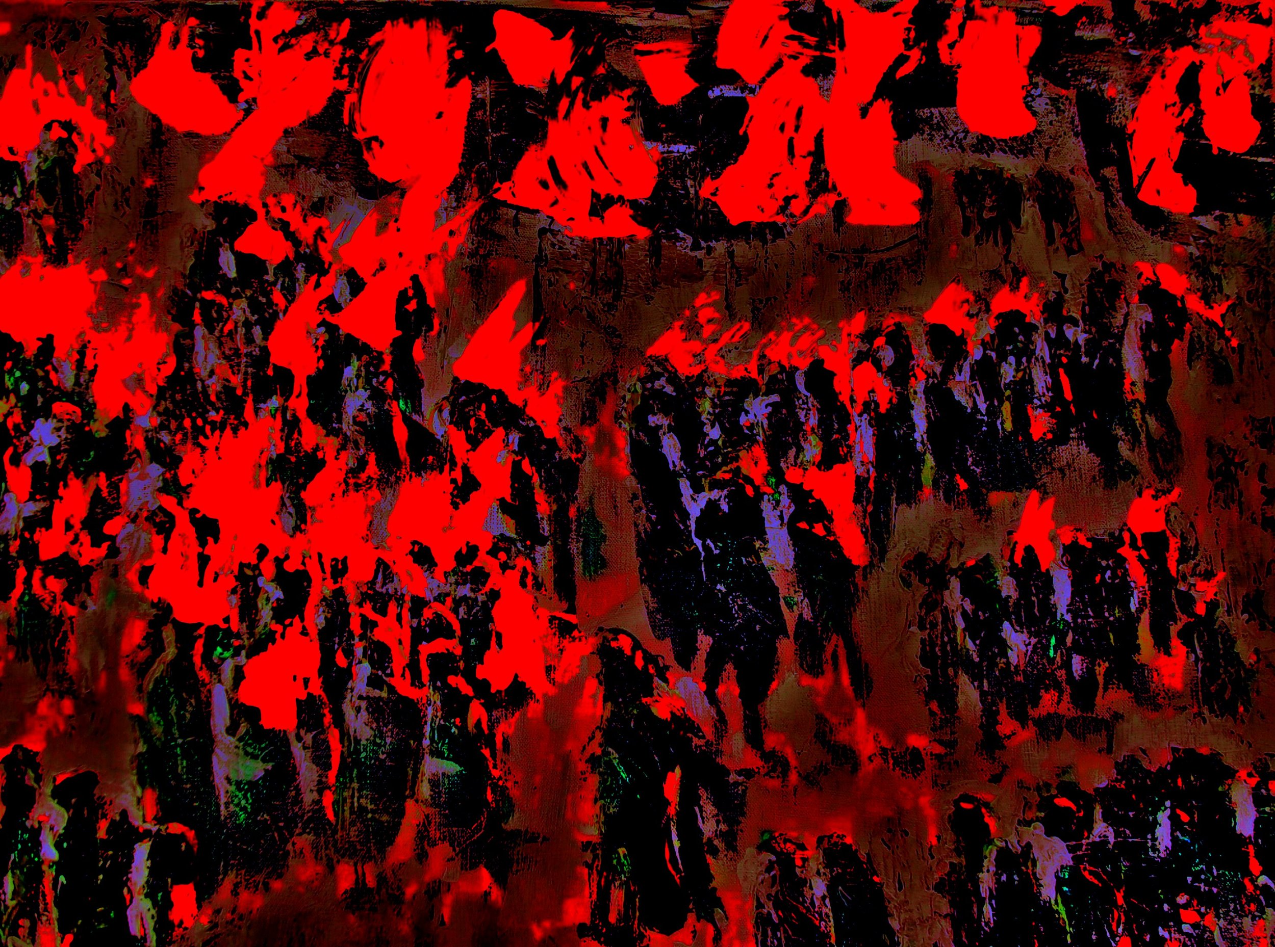 A large crowd of people holding red flags and banners at a protest or rally.