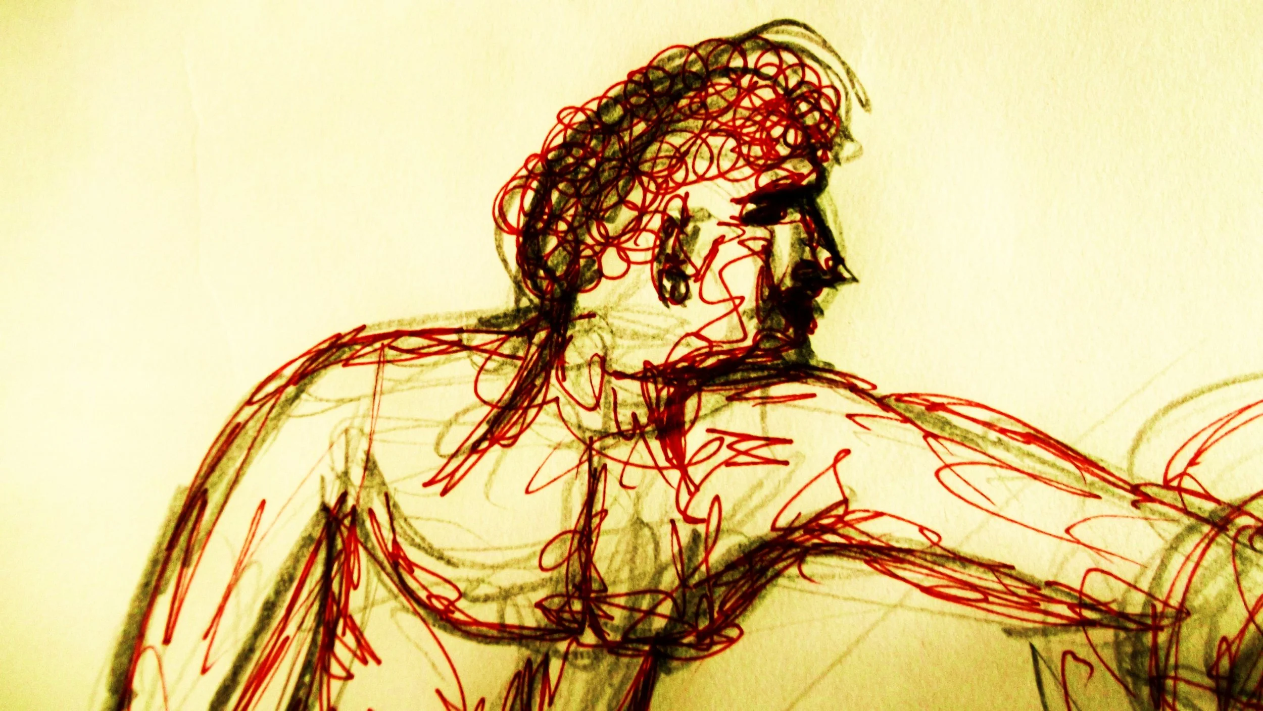 Sketch of a man with curly hair, beard, and mustache, shown in profile, resting his arm on a surface.