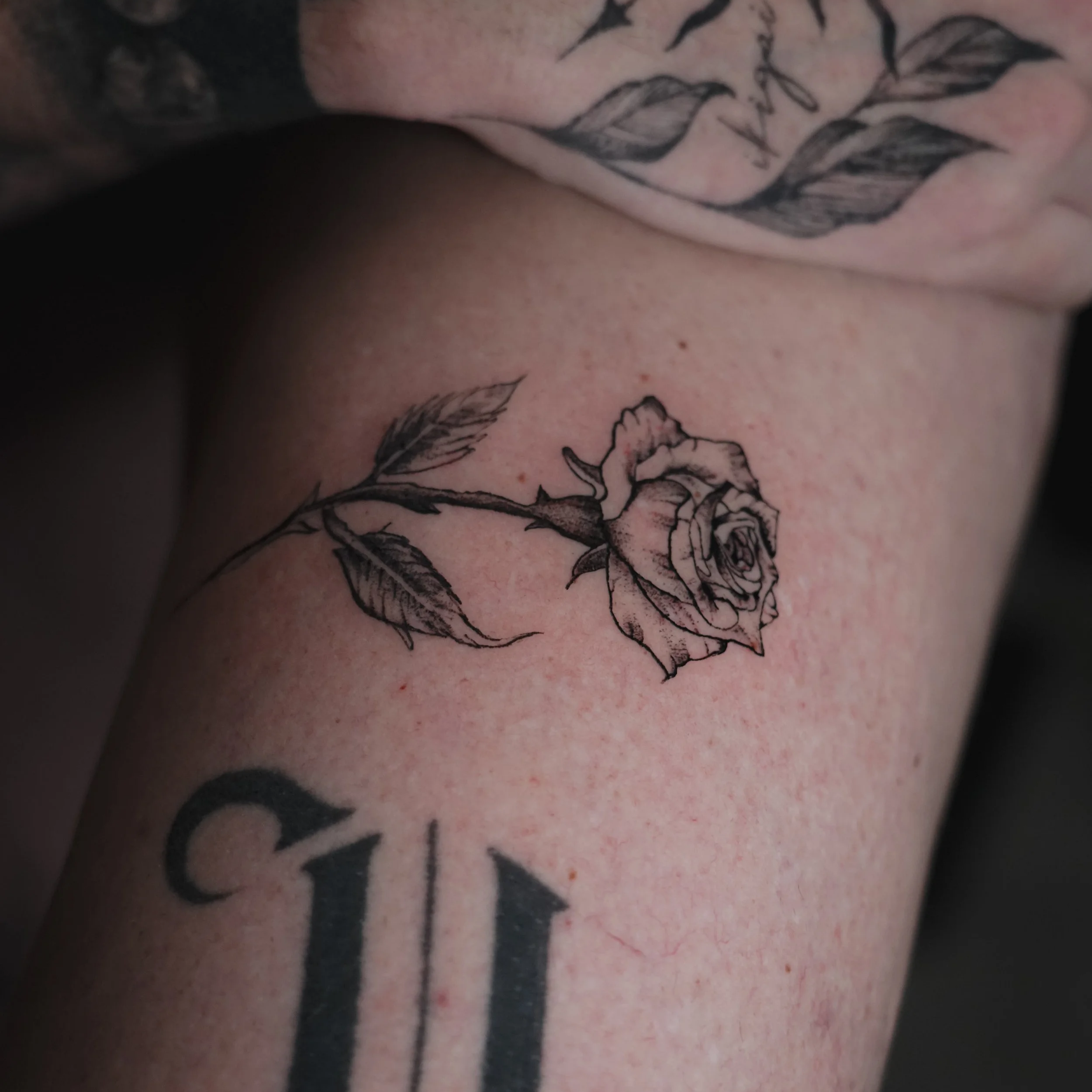 single rose black and grey tattoo