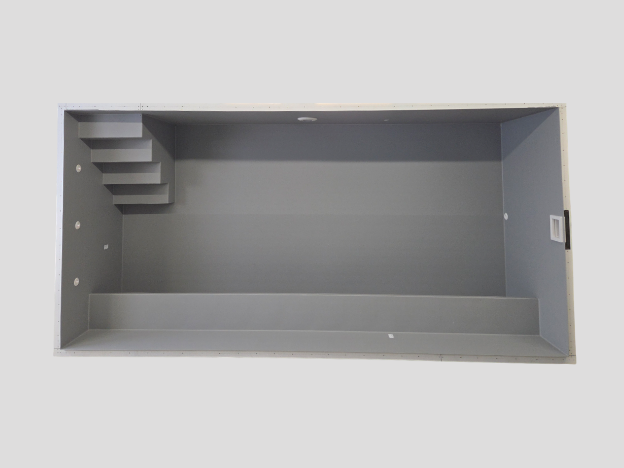 8x3 méteres kerti téglalap alakú műanyag medence belső lépcsővel, szürke színben.