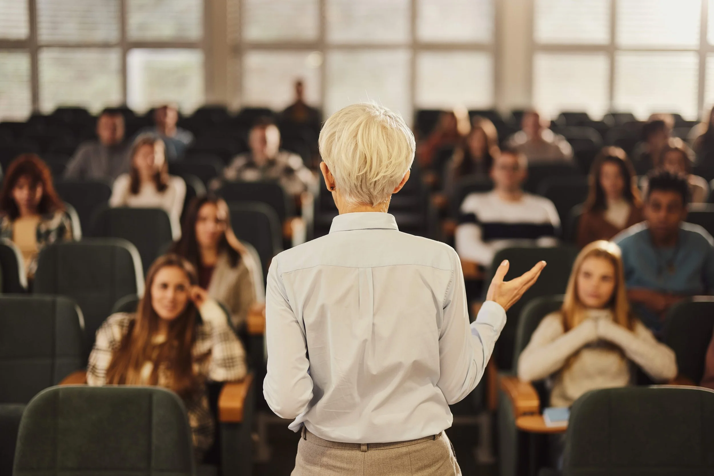 A student giving a speech in a class