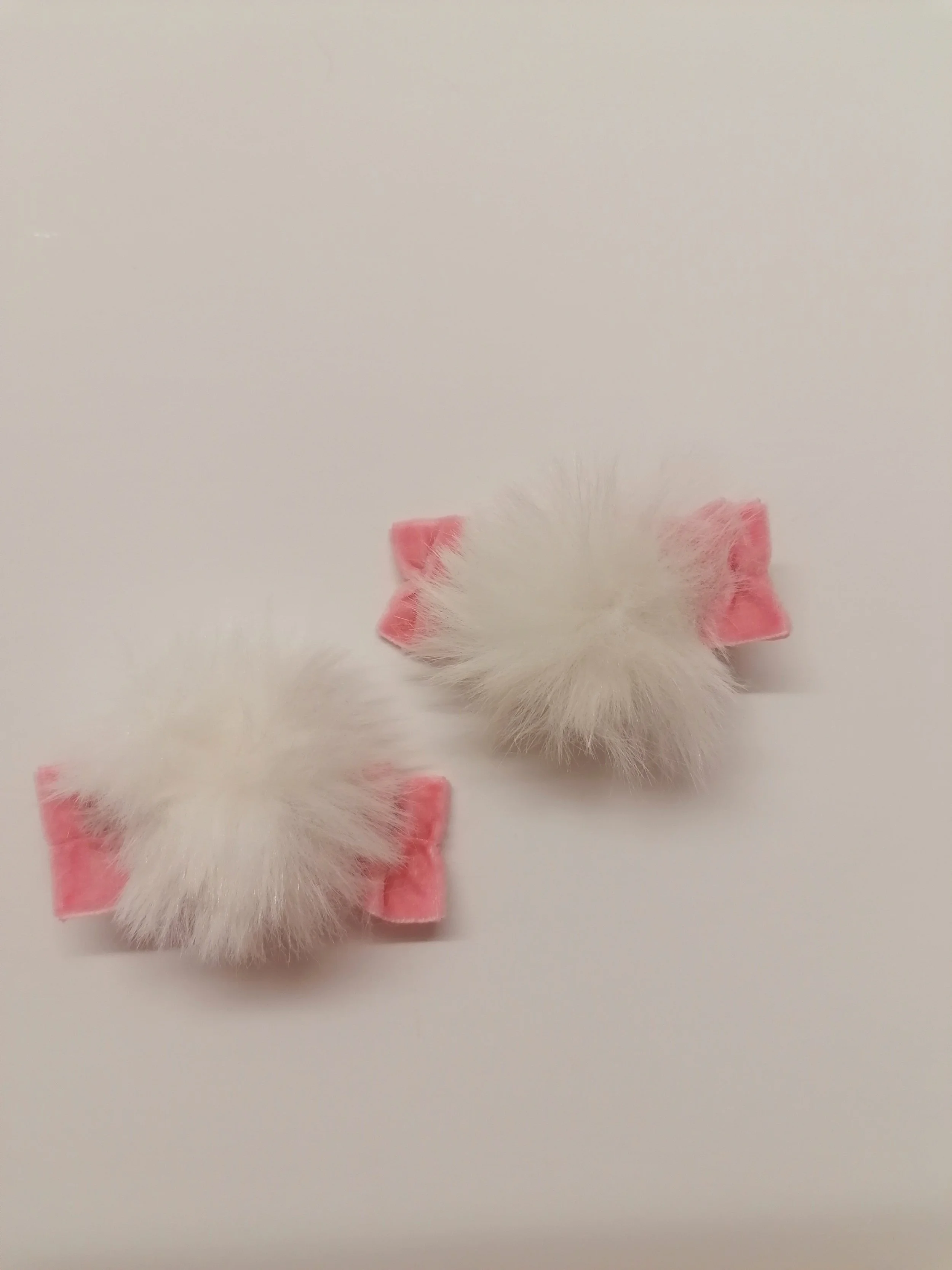Pink bunny tail clips
