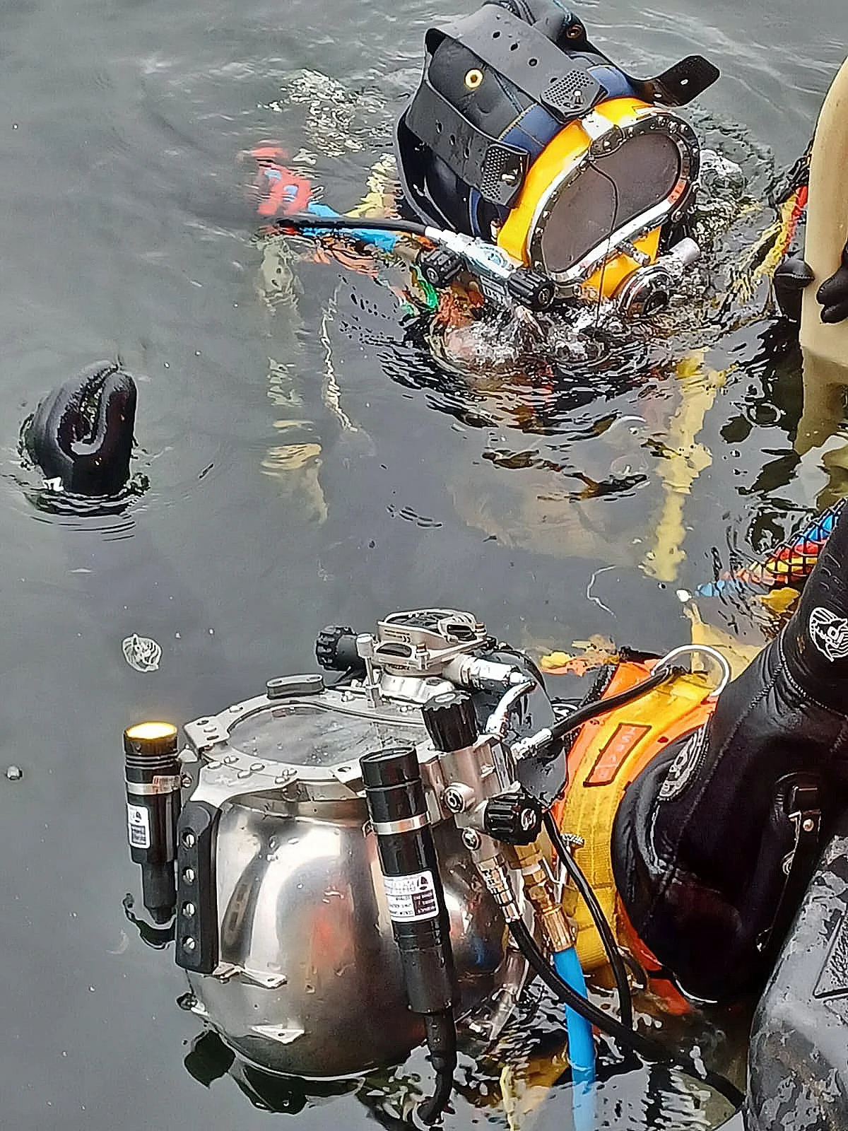 MMP standby diver simulating the rescue of a unconscious diver 