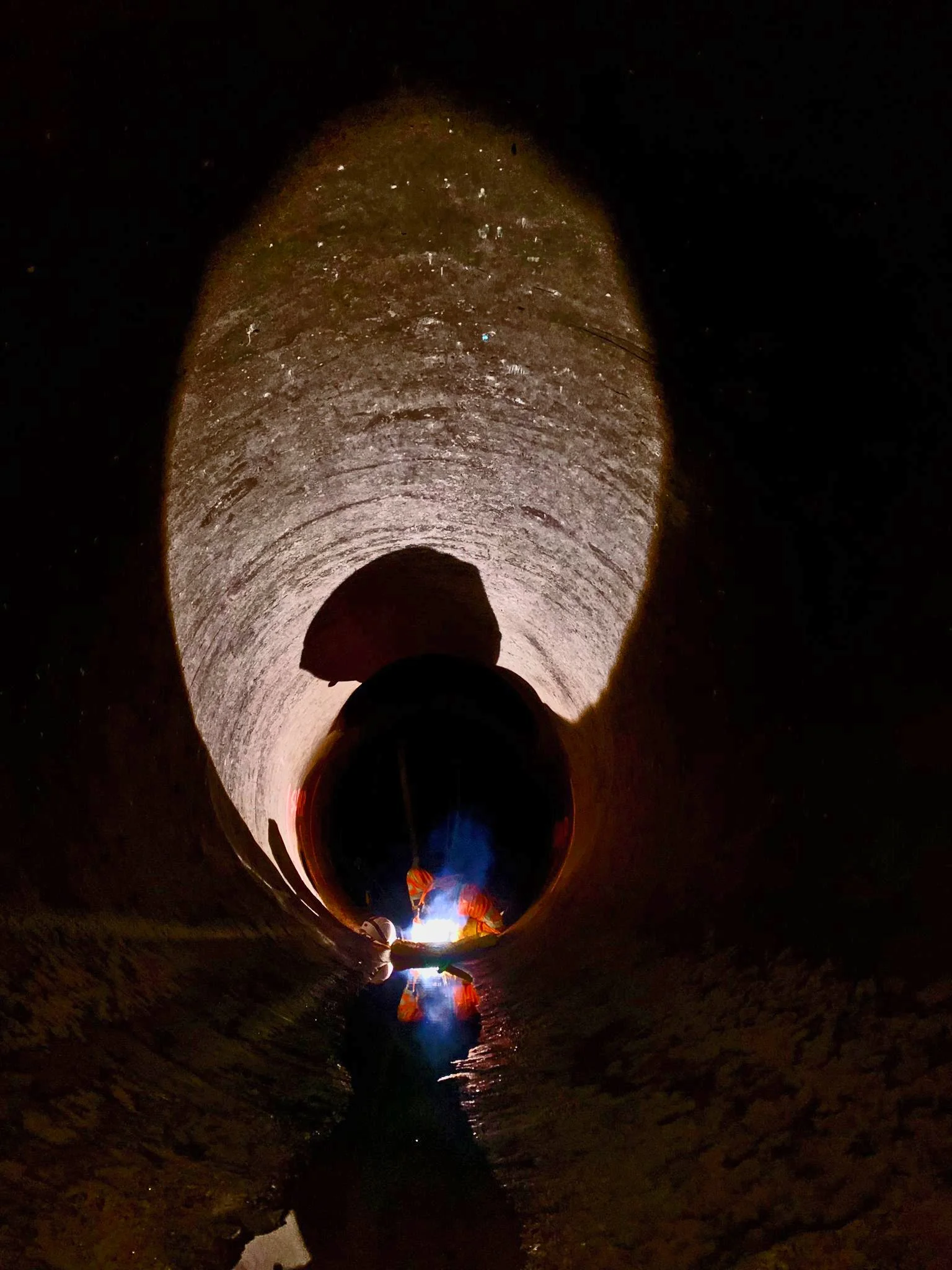 MMP welders working below ground installing valves & bespoke grills 