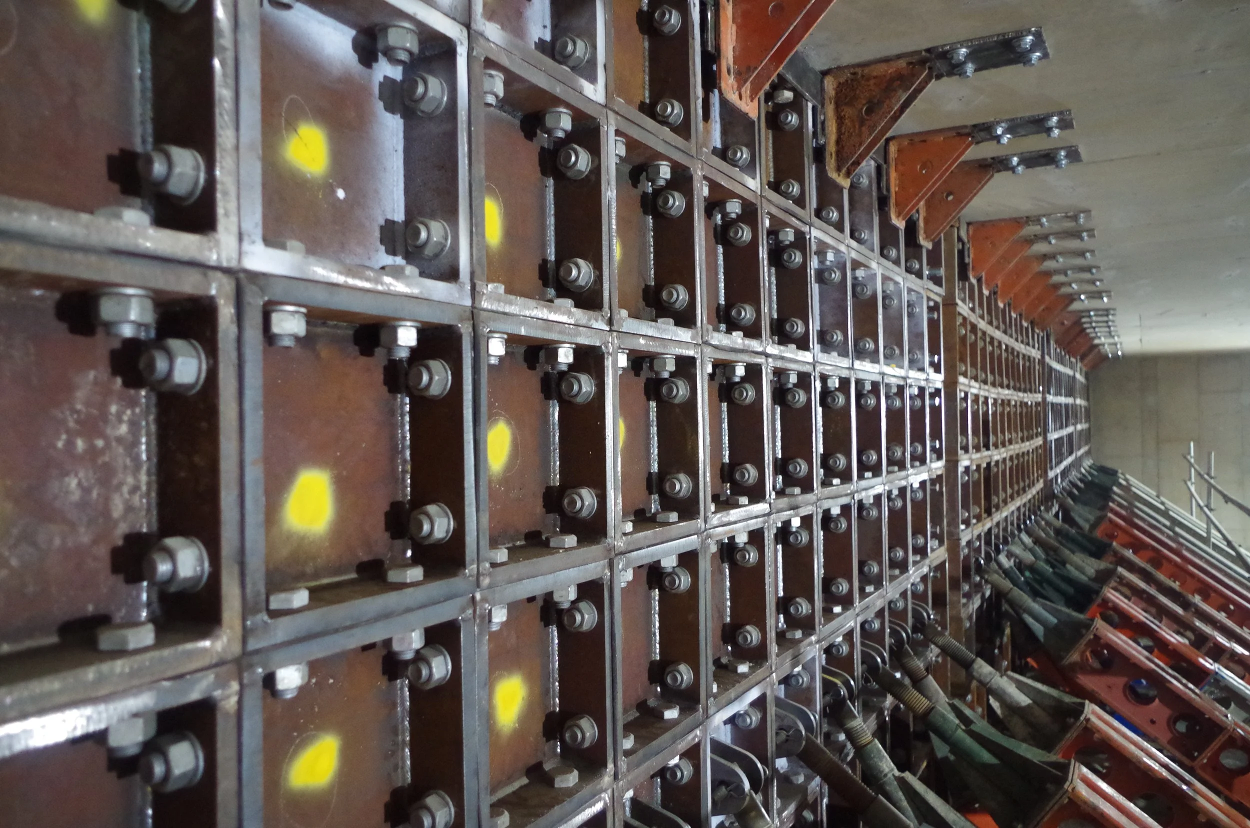 MMP confined space team installing a honeycomb secondary isolation wall