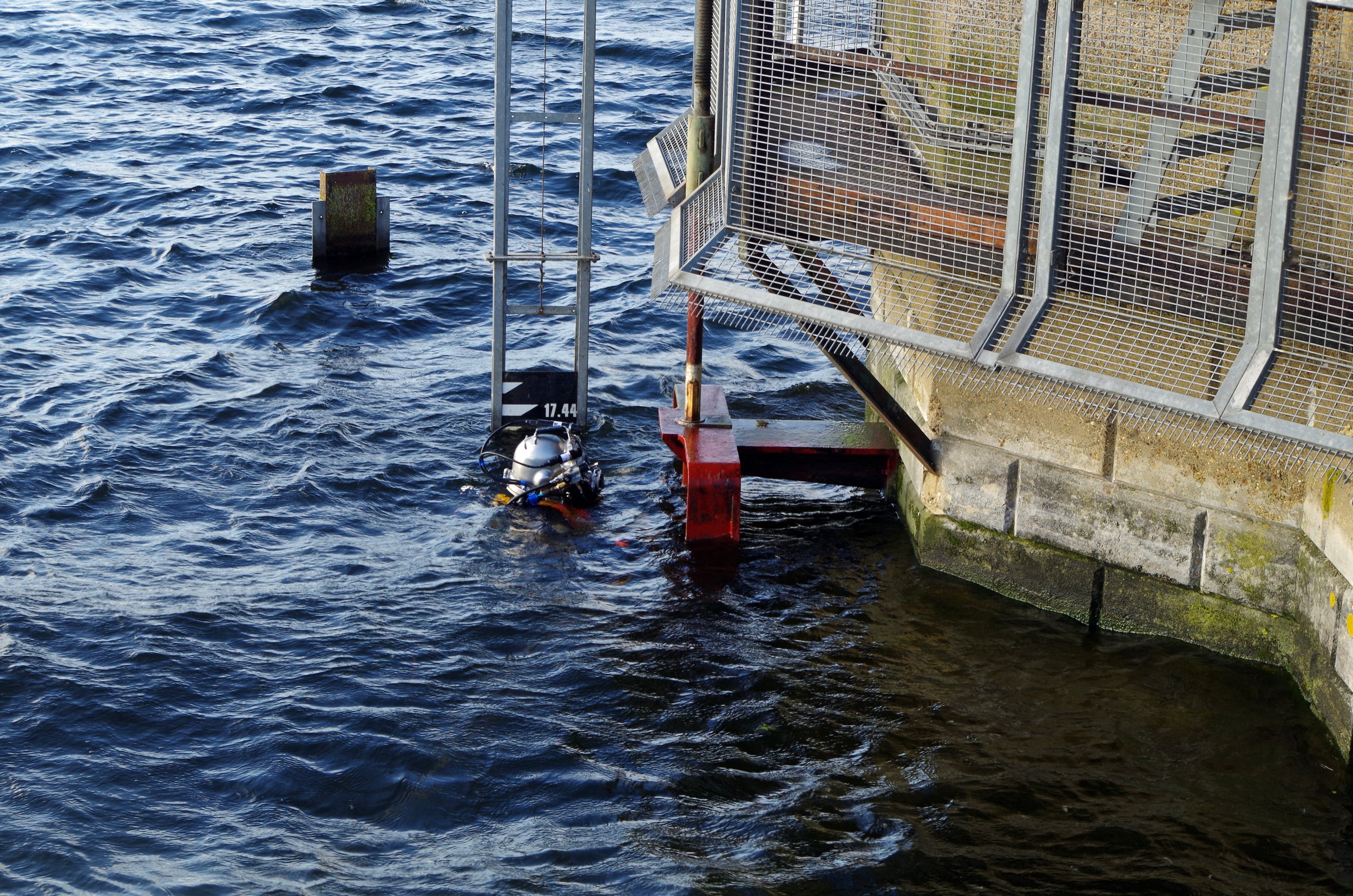 MMP diver measuring up for a secondary isolation plate 