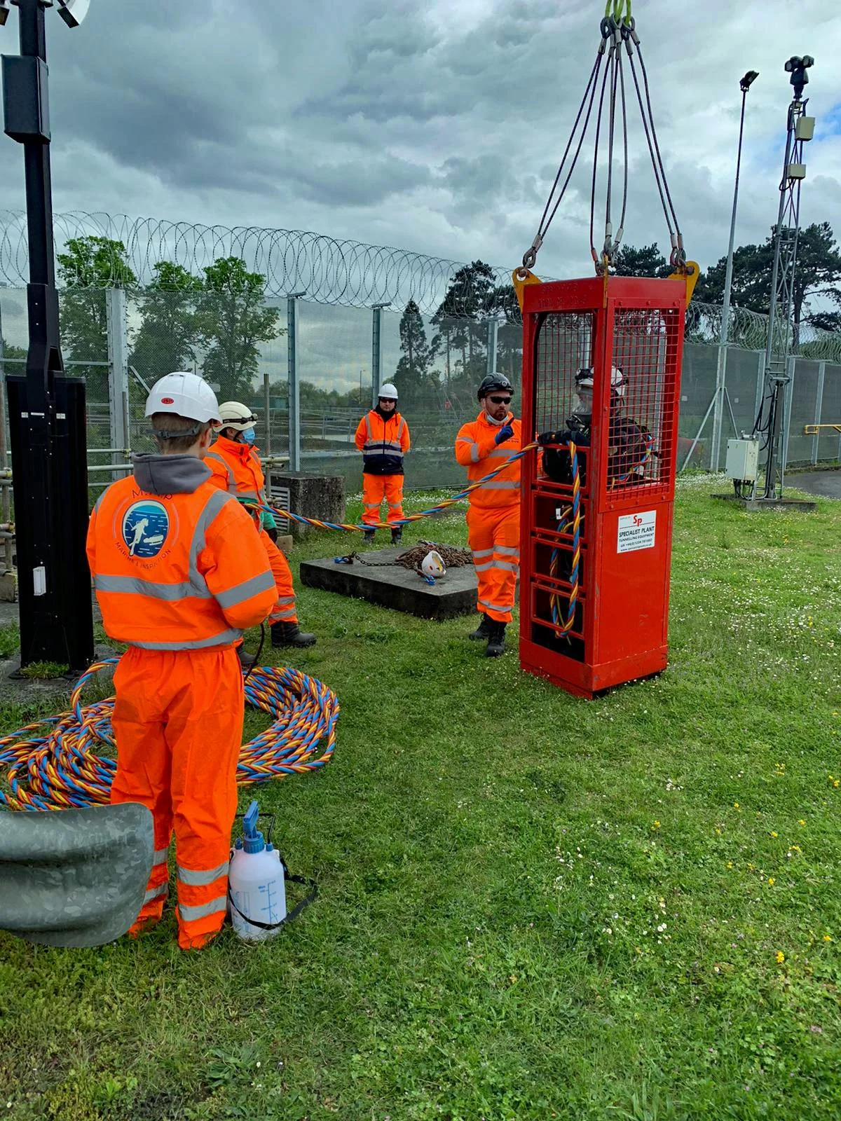 Confined space access using a man riding basket 