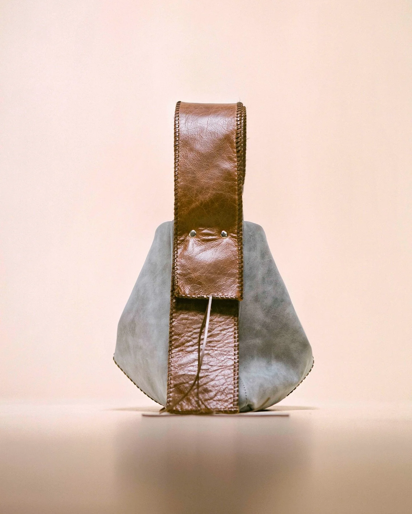 The Polaris Bag in Dusty Blue. Discover the Soluna range, available online.