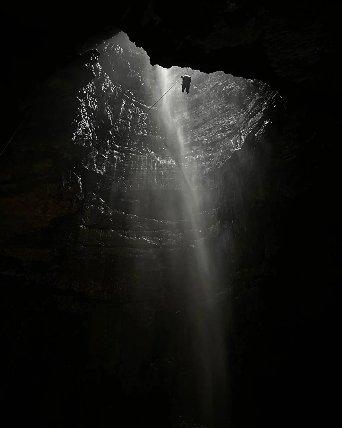 Descending into Gaping Gill, Yorkshire – UK

  People + Community, Atmosphere + Light  	