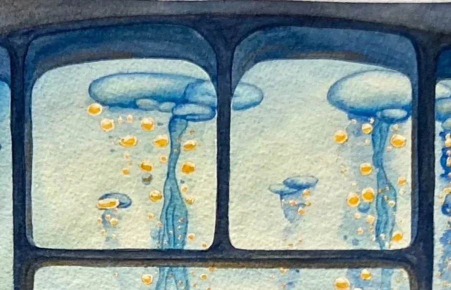 Image d'aquarium avec des méduses bleues et des bulles jaunes dans un environnement marin.