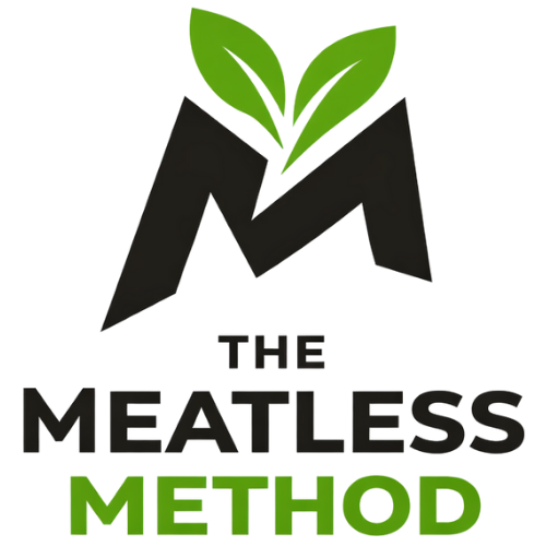 Logo with a black letter 'M' and green leaves above, with the text 'The Meatless Method' in black and green.