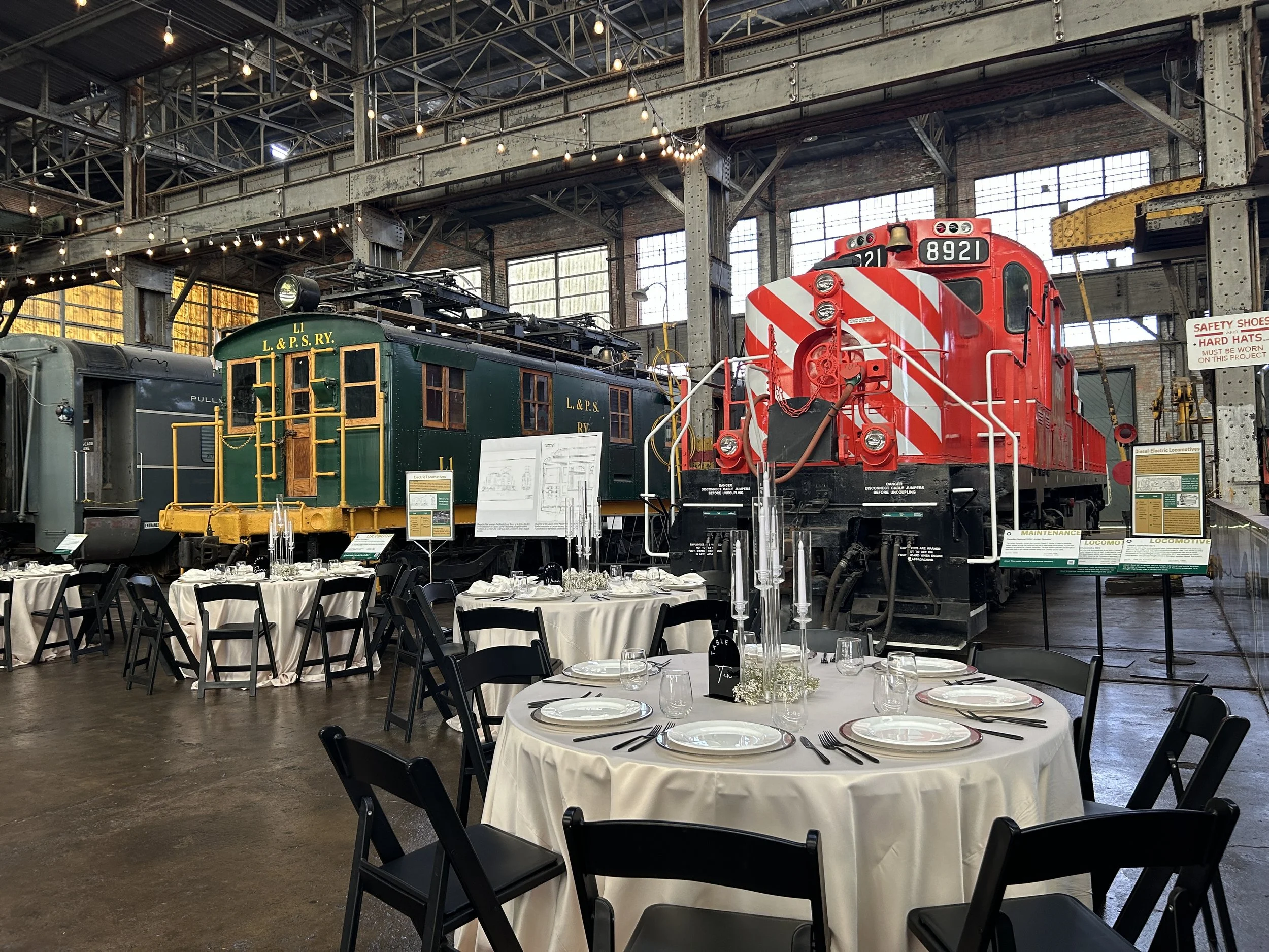 Wedding setup inside the Elgin County Railway Museum with L&PS L1 and CPR 8921 “The Empress of Agincourt” locomotives in the background