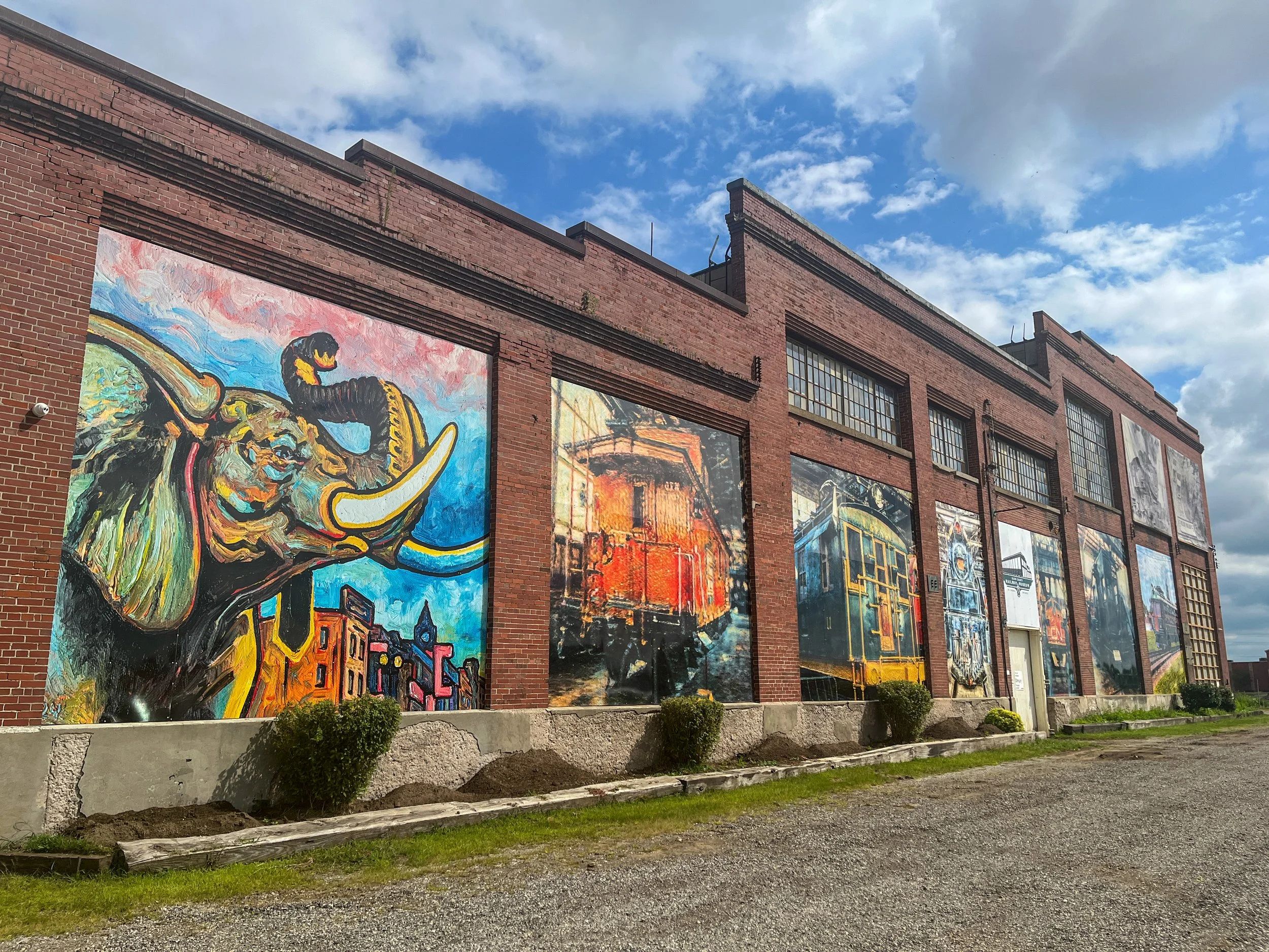 Exterior of Elgin County Railway Museum featuring new railway-themed murals