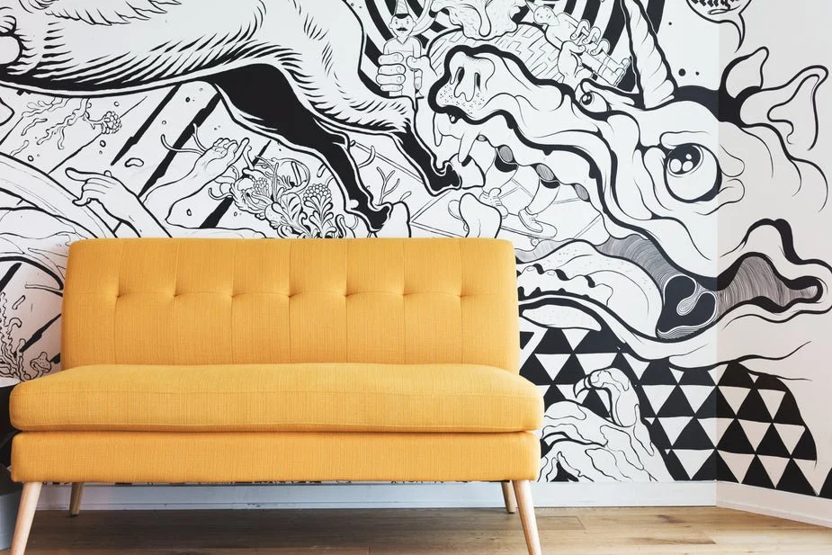 yellow-couch-by-black-and-white-mural_925x.jpg