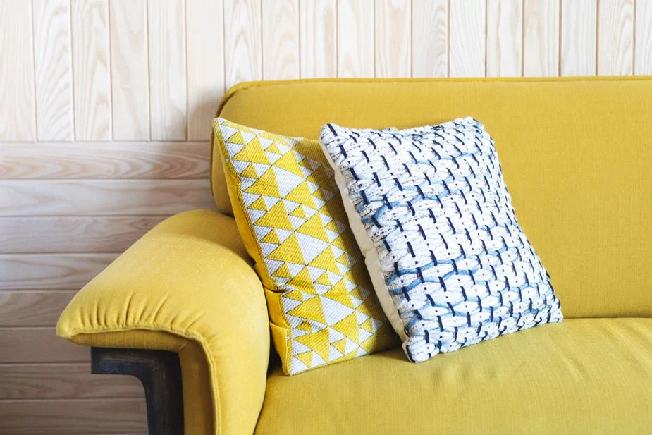 yellow-sofa-with-throw-pillows_925x.jpg