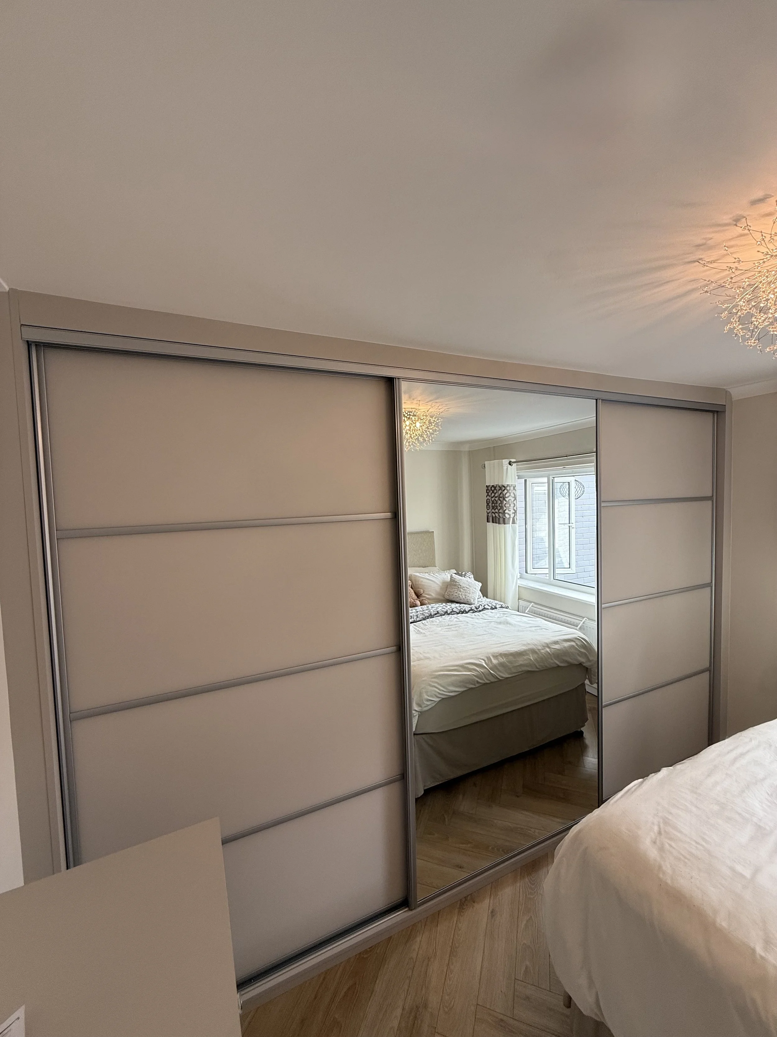 Satin coloured glass sliding wardrobe door finish