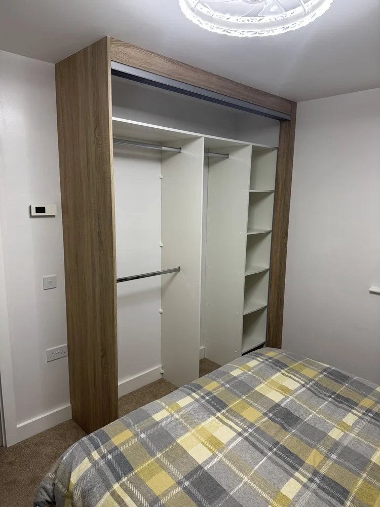Tall sliding wardrobe installation nearly 2.8m high
