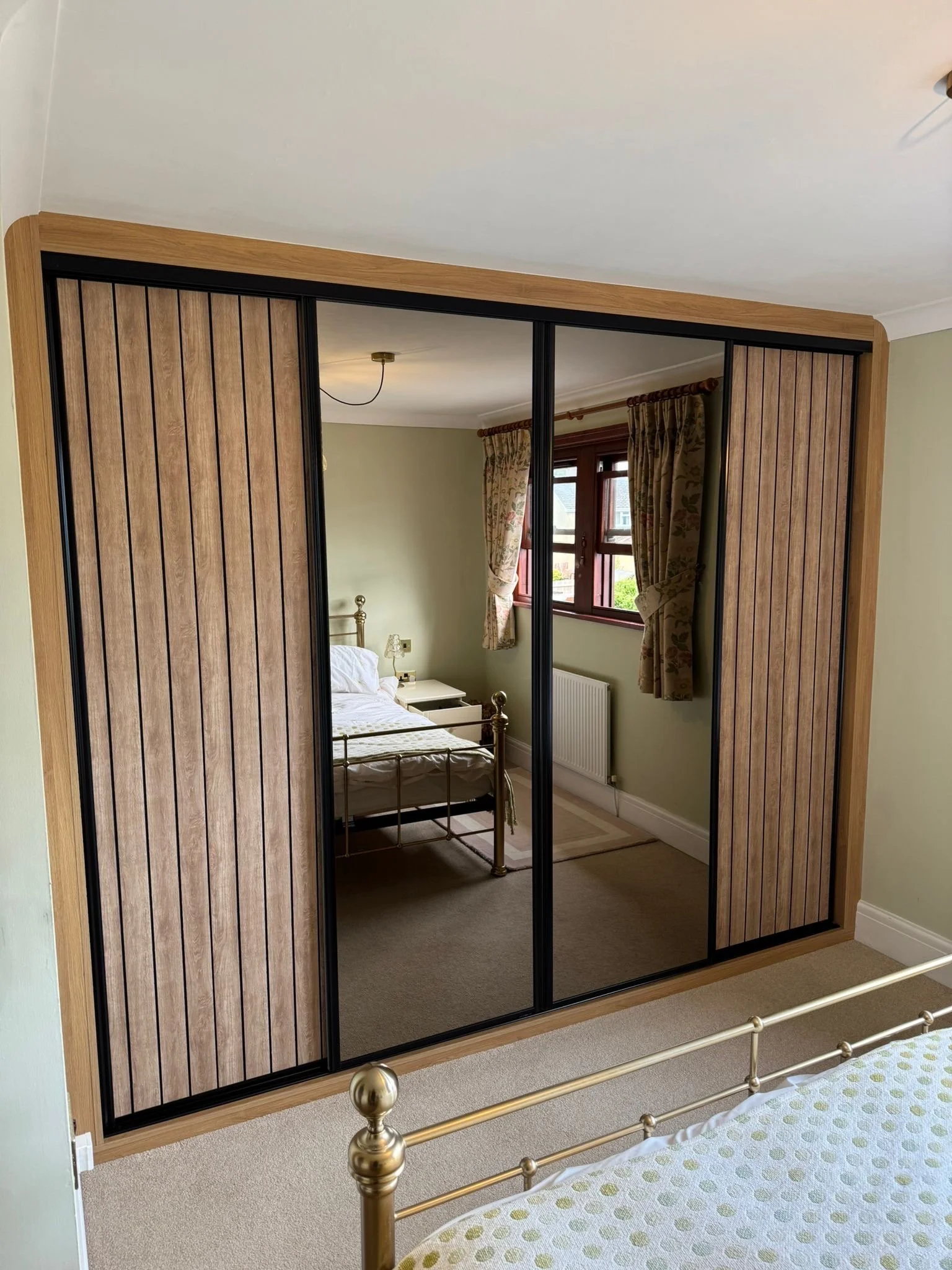 Acoustic panel sliding wardrobe door design by Wilkins Sliding Wardrobes