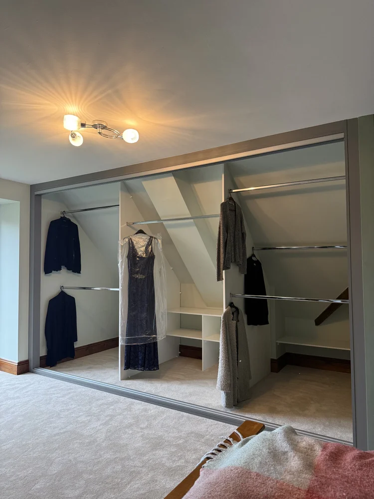 Made to measure fitted sliding wardrobe under angled ceiling Mountain Ash