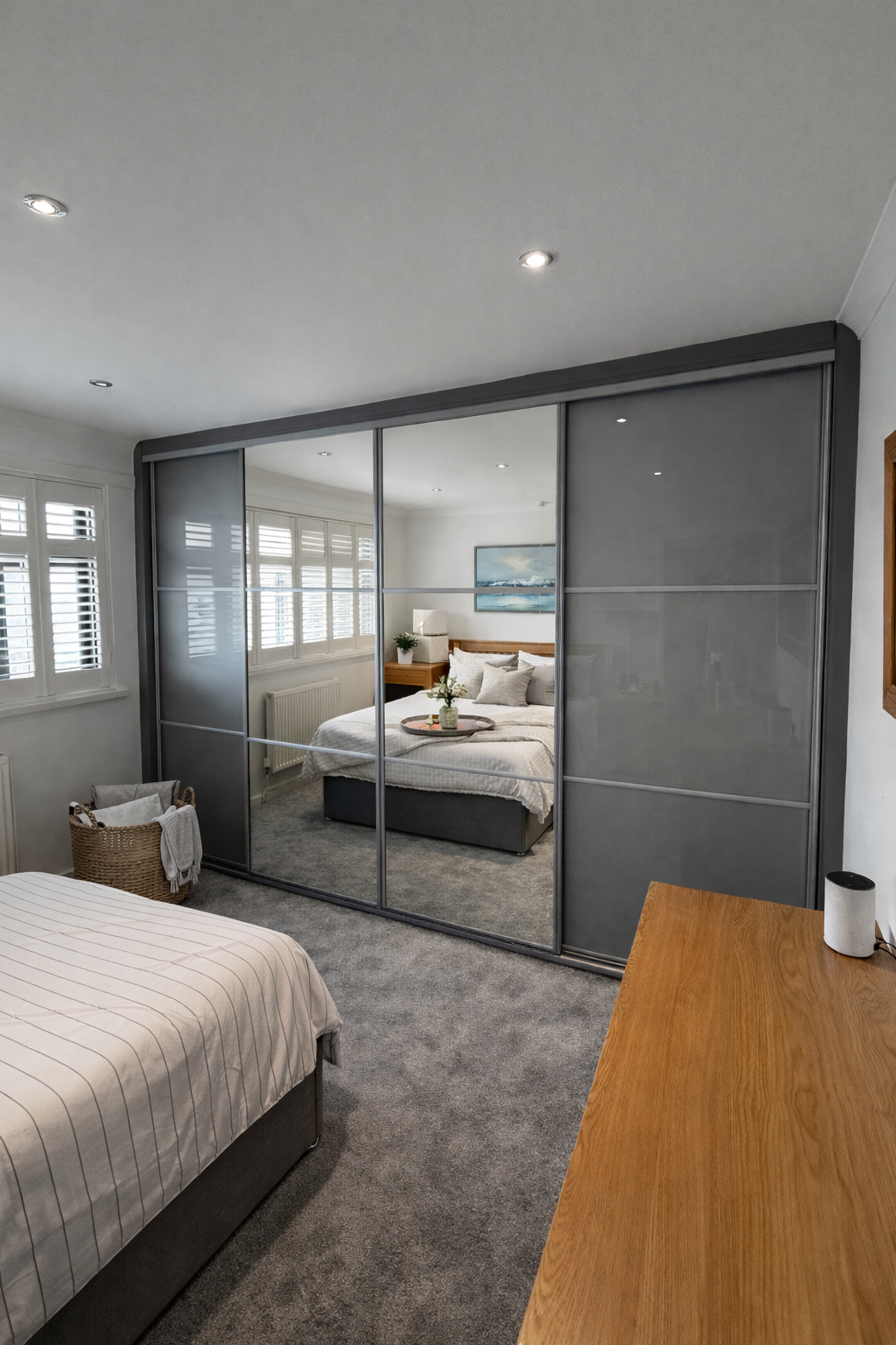 Made-to-measure coloured glass fitted wardrobe installation